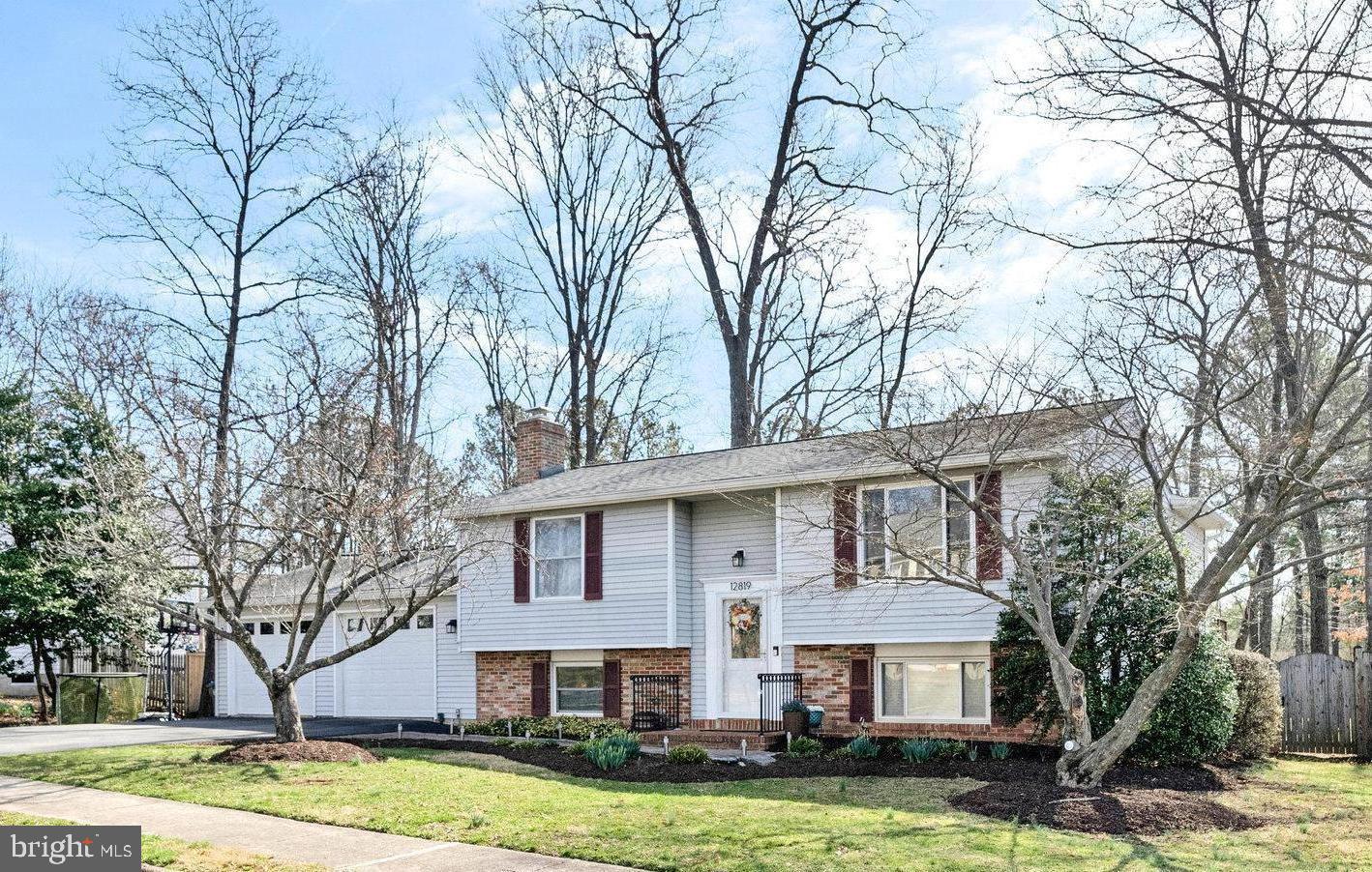 This move-in ready home is perfect for entertaining!  4 BR, 3 BA beauty features open dining and living, gorgeous sunroom, large deck over a fully fenced yard, luxury kitchen with pantry, and basement rec space, all tastefully redone in easy-to-customize neutral finishes.  Two main level and two downstairs bedrooms, three full bathrooms, and a .25 acre lot to enjoy.  Plenty of parking in your two-car garage, and a hidden storage space off the laundry.  All in highly sought after Fox Mill Estates, a beloved neighborhood close to retail, transit, bike trails, and all modes of transportation.  A great place to call home!