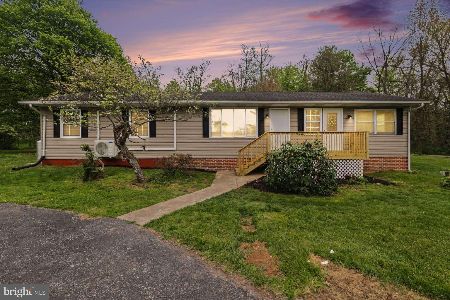 Back on the market This beautiful single floor rancher has been thoughtfully updated to provide contemporary comfort and style throughout. Step into an airy, inviting living space. The kitchen has all new appliances, granite counter, new cabinets, and propane gas stove. Located in Franklin Township Dillsburg, this 1750+ Sq Ft 3 bed 2 bath one floor sits on a spacious 1.48-acre lot. Beautiful views of the countryside just off Rt 15. A large rear deck to relax and enjoy the great views and entertain guests. Inside you'll find gorgeous modern home with a modern up to date feeling. Warm inviting living room with an electric wall mounted fireplace. A conveniently located laundry room. Two bedrooms on the right side of the house with to the left one large Master-Primary bedroom with its own bathroom and a huge walk-in closet. This home boasts a large commercial sized garage making it an excellent opportunity to for home bases business or workshop. Zoned as “Open Space” to create a personalized haven in a serene location. With on-lot well and sewer, new luxury vinyl plank flooring, new carpet in bedrooms, and updated bathrooms, this home is perfect. You will love everything this gorgeous home offers – see it before it’s gone!