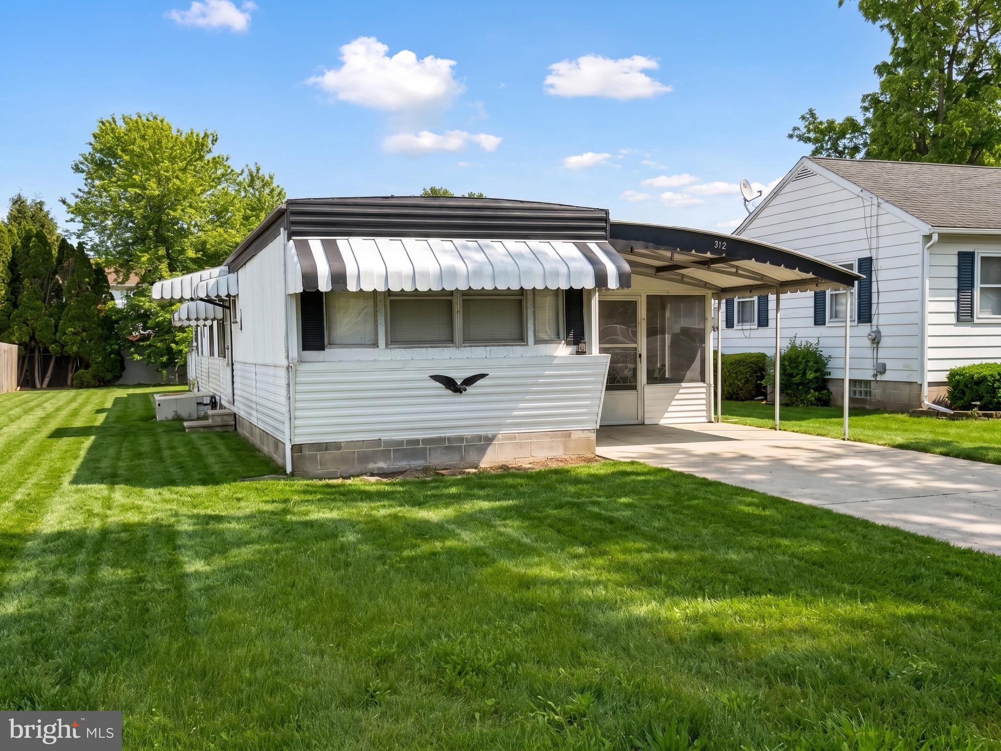 Affordable opportunity in the Southwestern School District! This renovated 1975 manufactured home is situated on a private fee simple lot and offers approximately 1,300 sq. ft. of living space, including a spacious side addition featuring a large family room.

Remodeled in 2023, the home offers 3 bedrooms and 1 full bath, an eat-in kitchen, and a spacious primary bedroom with walk-in closet. Enjoy additional living and outdoor space with a screened porch, Covered front porch ((10'x10"), rear patio (14'x12'), partially fenced yard, and storage shed (12'x12')

Additional features include a concrete driveway with parking for 2–4 vehicles plus on-street parking. HVAC system includes a heat pump with oil backup for year-round comfort and efficiency.

Located on a quiet street with convenient access to shopping, dining, and commuter routes. Move-in ready and well suited for owner-occupants or investors alike. Property is being sold “as-is”.