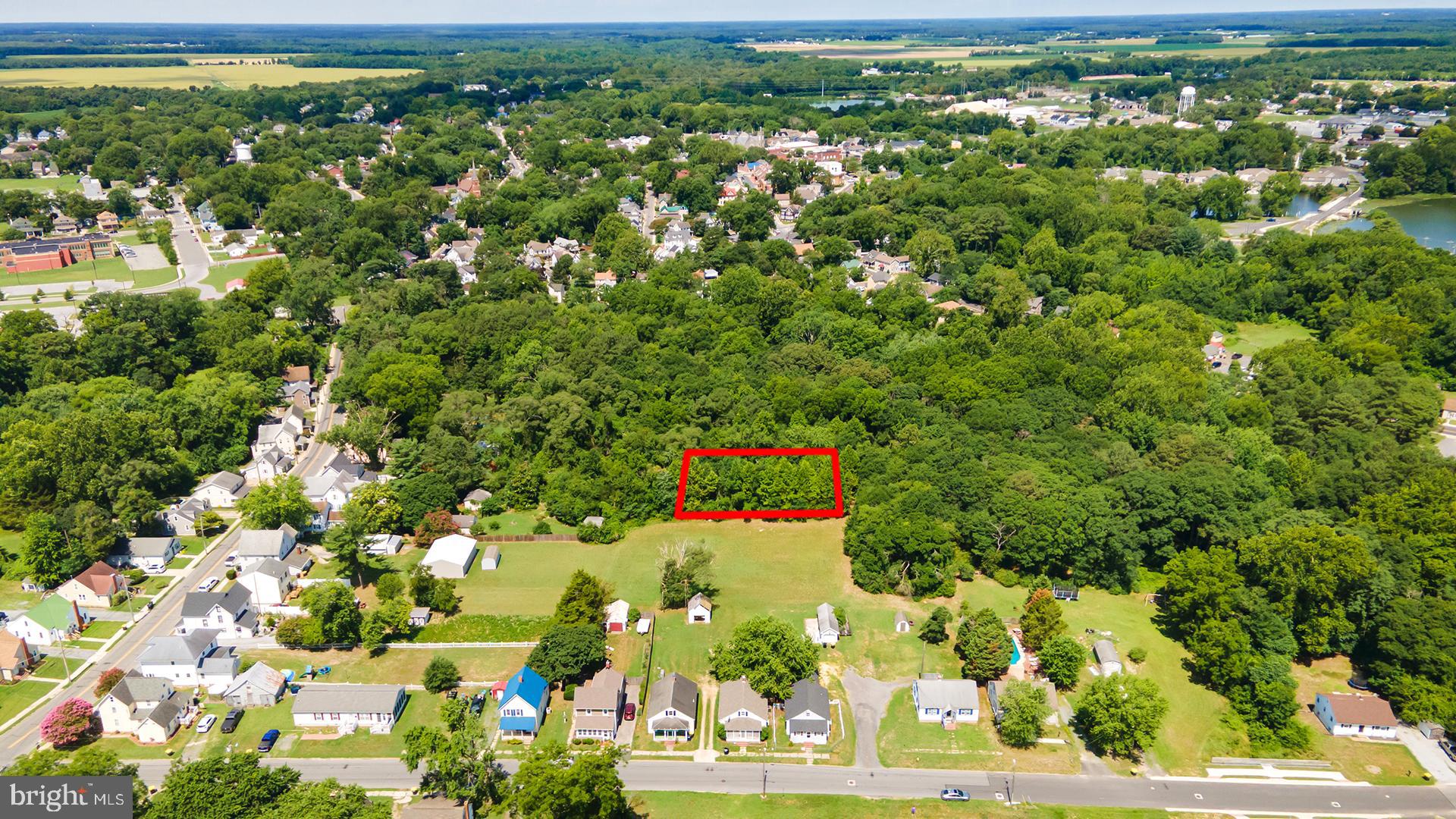 Are you looking to build your dream home on a small piece of paradise? Look no further. This wooded lot located within the town of Laurel, Delaware, offers you the conveniences of town living with a country feel. Broad Creek and the Nanticoke River are scenic highlights of this town complete with a kayak launch, walking trails and waterfront access at Laurel River Park, along with two other nearby parks that provide fun activities with picnic areas and playgrounds. Access is paper plotted and the main access will be from King Street. With Delaware’s beach shoreline in one direction and Maryland’s Eastern Shore amenities in the other, this property is your gateway to the Salt Life!