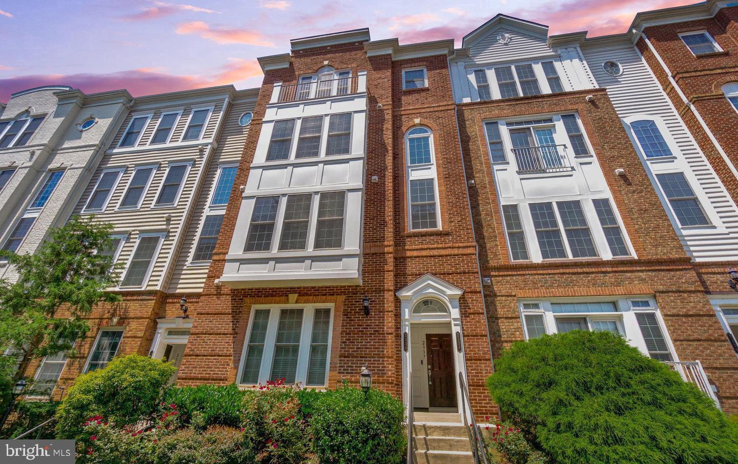 Welcome to the luxurious residence of 2337 Brookmoor Ln of Potomac Club. This spacious and tastefully curated brickfront condominium townhome is nestled within this highly sought-after, resort-style, gated community. Upon entering, you are welcomed by its bright and airy spaciousness, with 9 ft ceilings all throughout. Plenty of natural light illuminates the space, especially the living room with its gleaming hardwood flooring. This home features a formal dining room adjacent to a gourmet kitchen that opens up to both a breakfast nook, a balcony, and an entertaining space, adorned with a luxurious gas fireplace. The gourmet kitchen is complete with stainless steel appliances, granite countertops, and a large island that sits across from a 5-burner gas stove. It is truly a chef's dream. High ceilings lead you upstairs, opening up to a lovely den area adjacent to the primary bedroom, which features a large walk-in closet, dual sinks, a jetted tub, walk-in shower, and an enclosed toilet space. Two additional bedrooms are both spacious with plenty of closet space and natural light. As a homeowner of the Potomac Club community, you gain first class access to its multiple playgrounds and a recreational center which has a fitness center, sauna, and pool. This townhome is a short walking distance to high end shops within Stonebridge at Potomac Town Center, featuring Wegmans, Alamo Drafthouse Cinema, and over 20 dining options – perfect for fun and for leisure. Only minutes to I-95 & the VRE, 2337 Brookmoor Ln grants a lifestyle of convenience and luxury.