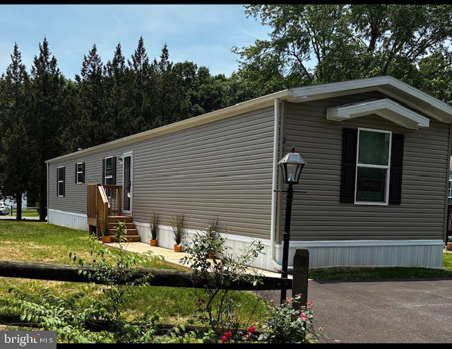 3 MONTHS FREE RENT!!!  HIGH END 2025 CLAYTON HOME THAT LOOKS NEW.  16 X 80 3 BD X 2 BA WITH LARGE BEDROOMS AND OPEN FLOOR PLAN.    HIGH END UPGRADES INCLUDE LOW E ARGON WINDOWS.  RHEEM WATER HEATER WITH MULPILE SETTING SUCH AS VACATION, ENERGY SAVER.  HIGH END HEAT PUMP WITH PROGRAMMABLE THERMOSTAT.  2 X 6 WALLS WITH UPGRADED INSULATION.  NEW FULL VIEW UPGRADED FRONT DOOR AND SO MUCH MORE.  NICE SMALL COMMUNITY WITH THE LOWEST GROUND RENT AROUND AT $870  PER MONTH.    LIKE TO BOAT OR FISH WELL FLYING POINT PARK IS RIGHT AROUND THE CORNER.   THIS HOME IS PRICED TO SELL AND IS A MUST SEE!!!   COMPARE THIS HOME TO OTHERS AS YOU WON'T BE DISSAPOINTED!!!