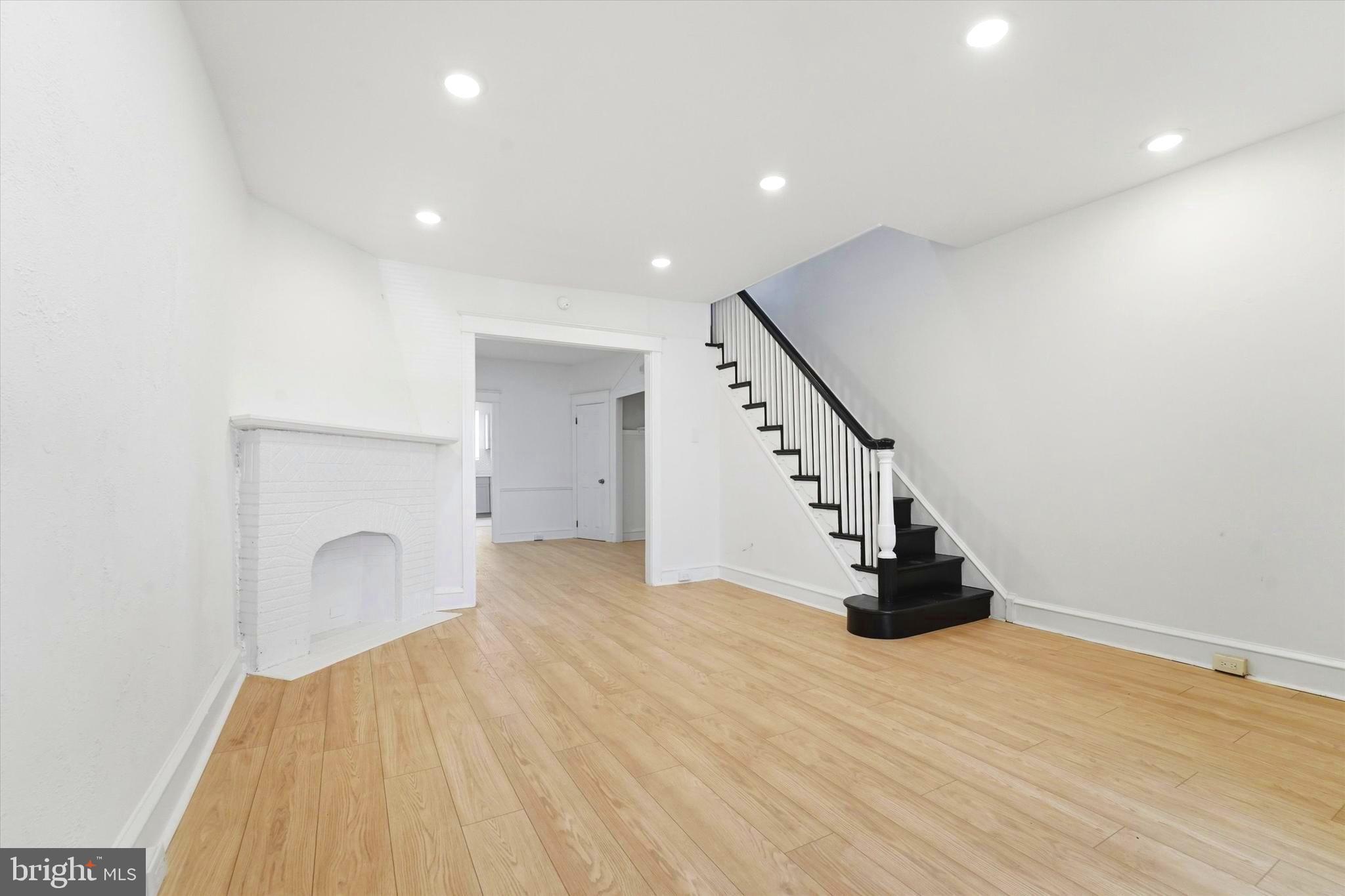 MOTIVATED SELLER!! Beautifully renovated 3-bedroom, 1-bathroom brick home in Wynnefield featuring modern finishes throughout. Step inside to an open-concept living and dining area with new light hardwood flooring, recessed lighting, and a sleek black stair railing that anchors the space. The north-facing living room fills with natural light from oversized windows.

The updated eat-in kitchen showcases gray shaker-style cabinetry, new black appliances including a gas range, and ample counter and storage space.  All three bedrooms are generously sized — the second and third bedrooms feature beautifully preserved original dark hardwood floors, adding character and warmth. The full bathroom has been completely redone with floor-to-ceiling marble-look tile and modern fixtures.

Rear exterior parking and lower level laundry completes this move-in ready package. Conveniently located with easy access to City Avenue corridor shopping, Fairmount Park, public transit, and Center City commuting routes. Excellent for first time buyers. Unbeatable combination of accessibility and convenience. Buyer may qualify for up to $28,000 in grant assistance.