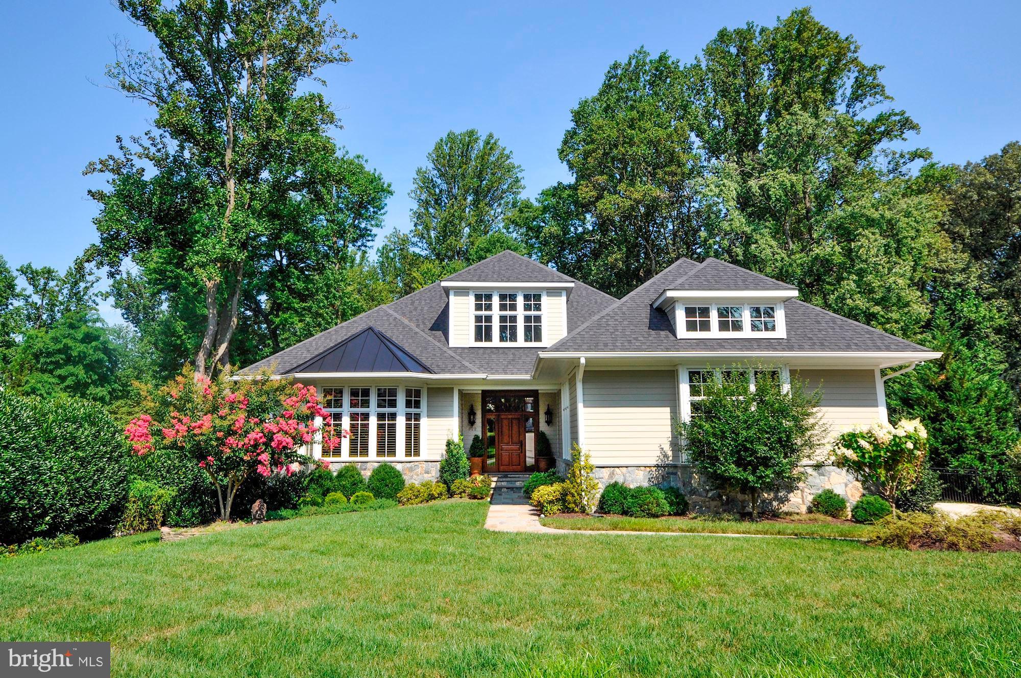 OPEN HOUSE CANCELLED. This stunning Tom Staats custom build is located in the Ayr Hill area in the heart of downtown NE Vienna.  The quality of construction of a Staats build along with thoughtful design provides +/- 5200SF of near perfection.  Graciously sited on a rare over half-acre lot that backs to Glyndon Park, the home's south-facing exposure provides incredible light throughout.  Features include 10 foot coffered ceilings,  wide-plank  hardwoods, bespoke gourmet kitchen, a breakfast room with a true atrium feel, a walnut paneled library, luxury primary bedroom and bath with large custom closet; 4 sets of french doors to rear deck and patio, screen porch, stone fireplace in great room, etc.  Designer details include custom window treatments, Schonbeck chandeliers, baths with custom tile, whole house audio, lower level with beverage centre, expansive outdoor entertaining areas with two hard-piped gas grills, and an exterior fireplace located under a water proofed deck. The flat rear yard is fully fenced with landscape lighting, irrigation and ample mature landscaping throughout the property.  The oversized 3 car garage (height could allow for lifts adding addition spots) is a rarity.   The wonderful floor plan has a gracious main level primary bedroom with less than 3 steps in and out of the home. Do not miss this special offering.