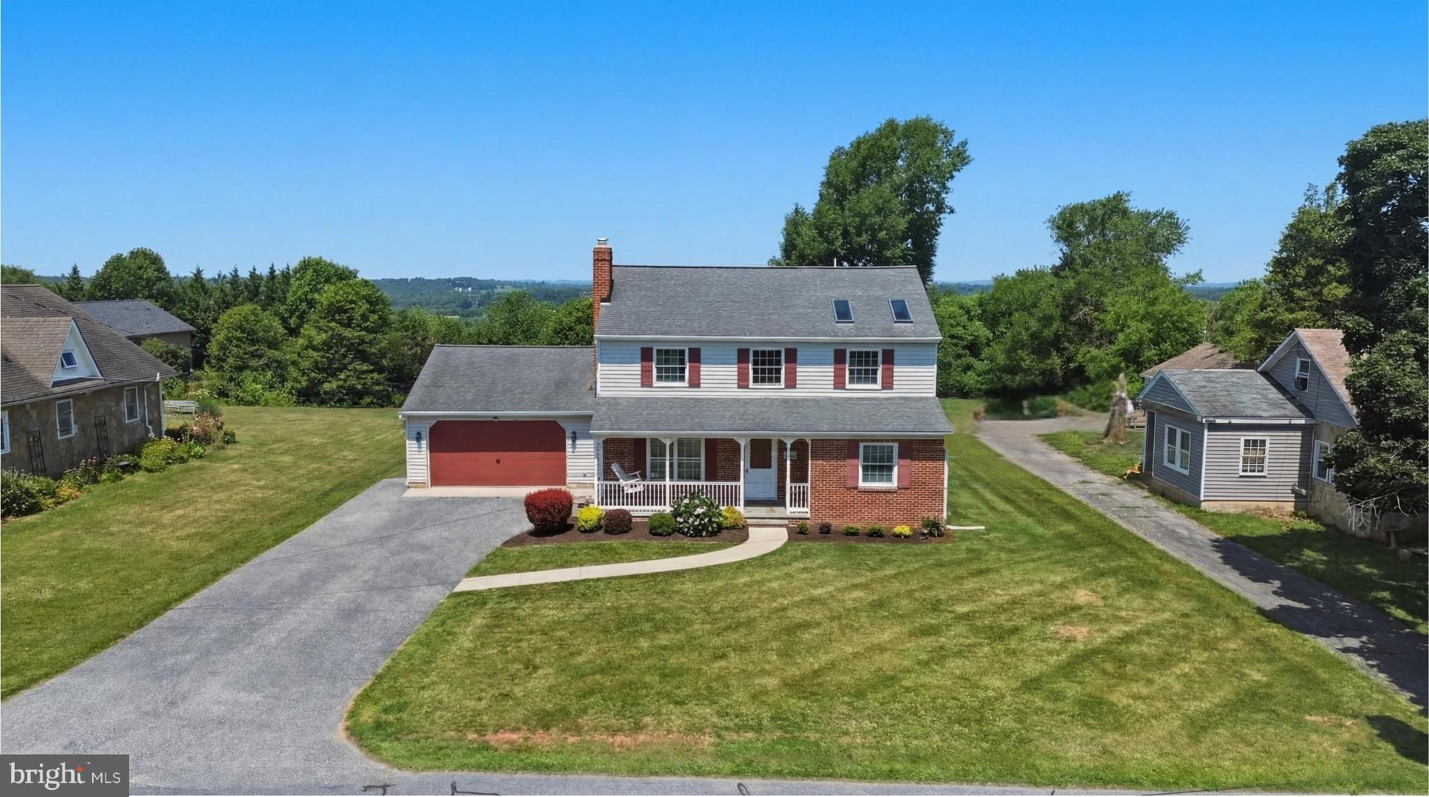 Meticulously maintained and updated. Prepare to be surprised by this spacious two story! Main entry into the formal living room with fireplace, formal dining room with built-ins and step down to family room & kitchen. Family room boasts a cathedral ceiling, picture window overlooking the backyard & western view and a fireplace with woodstove! Family Room is, open to the granite & maple kitchen with backsplash, stainless appliances, eating island & bamboo flooring. Mudroom with washer & dryer, stairs to basement and exit to over-sized two car garage. Huge upper level primary bedroom with walk in closet and shared bath with jetted tub & skylights, second bedroom with built-ins. There are two main level bedrooms and an updated full bath along with the 2 upper level bedrooms and full bath! A beautiful home!