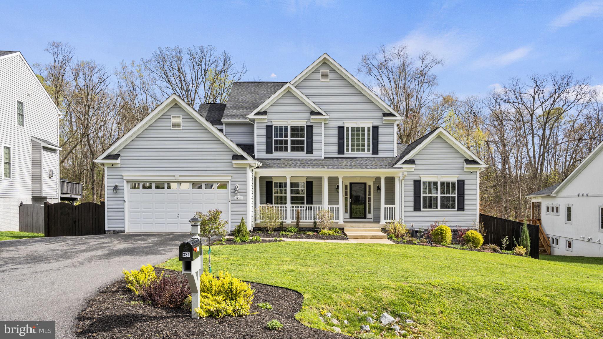 Beautiful seven year old home on a private cul-de-sac! This custom home was built by one of the top local builders in Fredericksburg and is loaded with extra features. Open floor plan with high ceilings. Gourmet island kitchen. FIRST FLOOR primary bedroom which is rare to find in a home in this price range. This home is move-in ready with new paint and flooring. Nothing to do but bring your furniture! Finished walkout basement, with room to add a Au Pair suite. The private back yard with oversized covered deck, complete with gas hookup, backs to trees for the ultimate in privacy. Below the deck is extensive hardscaping, surrounded with easy to maintain, professional landscaping. Don't miss the opportunity to own a unique custom home close to the VRE, and I-95 for commuters. This one has it all! Come check it out at the open house Saturday, April 6th!