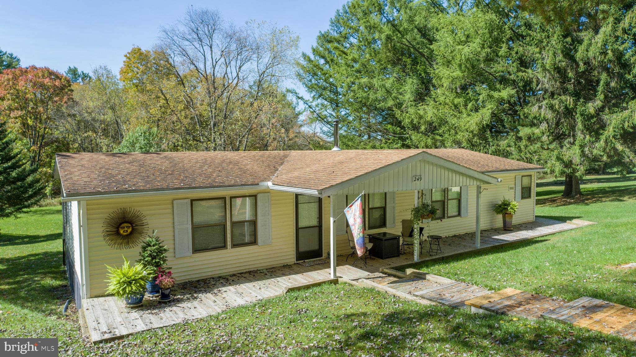 Charming 3-bedroom, 2-bath ranch-style home offering direct access to Deep Creek Lake and beautiful water views. Situated on a level lakefront lot, the property provides easy access to the shoreline for swimming, kayaking, paddleboarding, and relaxing by the water. The spacious deck overlooks the lake, creating the perfect setting for outdoor dining, entertaining, or simply enjoying the scenery. Conveniently located near area restaurants, marinas, and year-round recreation, this property is an excellent opportunity for a vacation getaway, rental investment, or full-time residence. Call today to schedule a private showing!