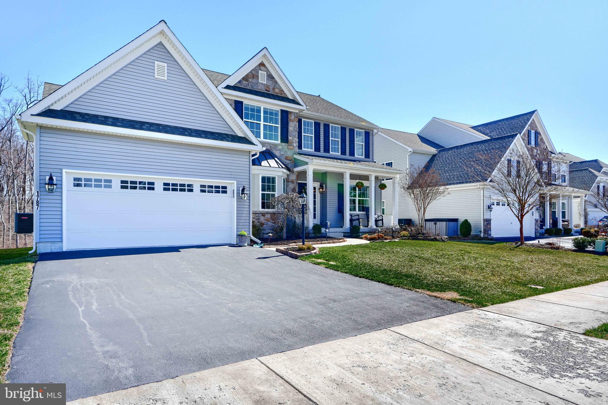 Welcome to this amazing Augusta model home situated on a premium lot backing to trees in the lovely Eva Mar Farms off 543 in Bel Air just minutes from 95 and Main Street.  This five bedroom, four full bath property will surely meet all your family needs.  The home has great curb appeal with professional landscaping and a covered front porch with built-in-planters.  Enter into the large, open foyer and be greeted by the gorgeous formal dining room with a bay window that has room to seat 10-12 people.  Off the foyer, you will also find a guest bedroom and full bath.  Continue into the heart of the home featuring a family room with a double sided gas, stone fireplace for those chilly nights and the huge Chef's kitchen with a GE Monogram 8 burner stove w/double oven, quartz countertops, 42" soft close cabinets with pull out shelving, a farmhouse sink, large island with seating for 4 and an extended area for casual dining with display cabinetry and serving area.  The first floor laundry room is just off the kitchen making life a little simpler.  The first floor primary bedroom has 2 walk-in closet and a gorgeous en-suite.  The Venetian bath  is a true paradise with a walk-in-shower, dual vanities, private WC and a free standing tub to take those relaxing baths after a long day.  Step outside to the covered back porch with composite decking and a gas, stone fireplace.  Sit and sip your coffee while listening to all the nature sounds.  The deck also has a gas hook-up for your grill and seating area for dining al fresco with friends and family. The upstairs has 3 large bedrooms all with walk-in-closets, full bath with double sinks and a generous sized loft that can adapt to your family needs.  The lower level has a huge finished rec area with LVP that gets tons of natural light and an expansive , unfinished storage area.  Step outside to your level yard with a built-in fire pit, room for your gardens and backing to trees for privacy. Other features - engineered, hardwood floors on most of the main level, the stairs and upstairs loft area.  All three levels  bumped out for added space.