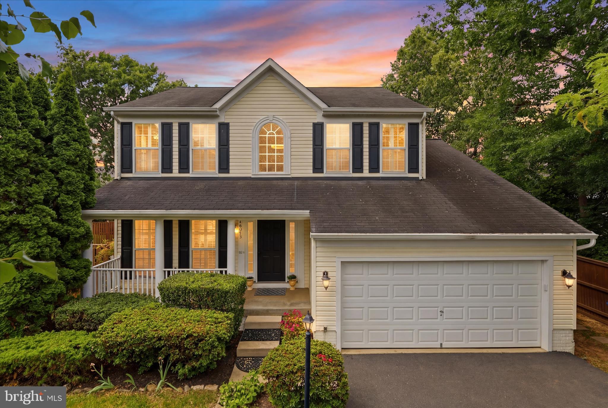 Open House this Saturday from 1-3PM! Beautiful Colonial offering 4 bedrooms, 3.5 baths, a 2-car garage, and an exceptional fenced backyard designed for both everyday living and entertaining. Move-in ready and thoughtfully updated throughout, this home features a stunning renovated owner's suite, expansive outdoor living spaces, and a fully finished walk-up lower level.
A charming front porch creates a warm first impression and the perfect place to relax and enjoy the neighborhood. Inside, you'll find bright, inviting living spaces enhanced by plantation shutters, neutral paint, and abundant natural light. The spacious kitchen serves as the heart of the home with white cabinetry, granite countertops, stainless steel appliances, a center island, and a sunny breakfast area with direct access to the expansive composite deck. The adjoining family room offers custom built-in shelving surrounding a cozy gas fireplace, while the formal living and dining rooms provide elegant spaces for entertaining.
Upstairs, the luxurious owner's suite is a true retreat featuring vaulted ceilings, a walk-in closet, and a beautifully renovated spa-inspired bath. Designer finishes include dual floating vanities with illuminated mirrors, marble-look tile, a spacious walk-in shower with a custom niche, and upscale fixtures throughout. Three additional generously sized bedrooms and a well-appointed hall bath complete the upper level.
The fully finished walk-up lower level is ideal for entertaining, featuring a spacious recreation room, a custom wet bar with striking architectural details, a bonus room perfect for a home office, gym, or guest space, and a full bath for added convenience.
Step outside to enjoy exceptional outdoor living with an expansive composite deck featuring decorative privacy panels and multiple spaces for dining, relaxing, and entertaining. The large, level, fully fenced backyard offers endless possibilities for play, pets, gardening, or future outdoor enhancements.
Perfectly situated in a sought-after community, residents enjoy the neighborhood pool directly across the street along with convenient access to the Silver Line Metro, Route 28, the Dulles Toll Road, premier shopping, dining, and major commuter routes. Water heater (2020), and kitchen appliances (2023)