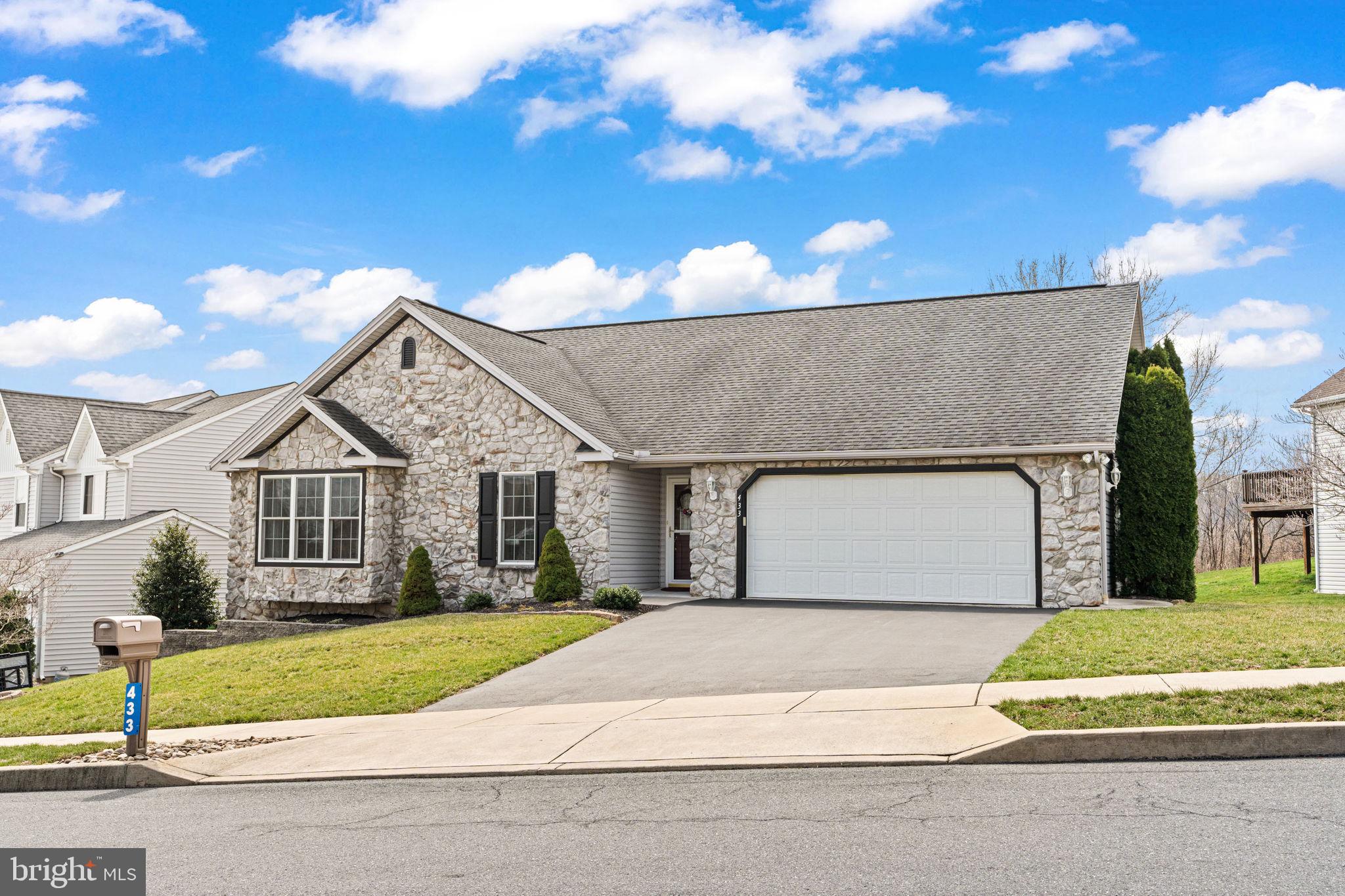 STUNNING 3 BEDROOMS, 3 FULL BATHS, 2100 SQ FT RANCH HOME WITH 2-CAR GARAGE LOCATED IN HIGHLY DESIRABLE FAIRVIEW RIDGE DEVELOPMENT CONVENIENTLY LOCATED OFF OF I-83. YOU WILL FALL IN LOVE WITH THE SPACIOUS OPEN FLOOR PLAN WITH LOTS OF NATURAL LIGHT.  THIS HOME OFFERS A LARGE LIVING ROOM, DINING AREA & GORGEOUS KITCHEN FEATURING QUARTZ COUNTERTOPS, SOFT CLOSE DRAWERS, CHERRY CABINETS, TILE BACKSPLASH, STAINLESS STEEL APPLIANCE PACKAGE & PANTRY.  YOU WILL ALSO LOVE THE IMPRESSIVE OWNER'S SUITE WHICH INCLUDES A WALK-IN CLOSET, PRIVATE BATHROOM WITH WALK-IN SHOWER & PRIVATE DEN/OFFICE.  THE 1ST FLOOR ALSO OFFERS A VERY NICE GUEST SUITE FEATURING A HUGE WALK IN CLOSET & PRIVATE BATHROOM WITH DOUBLE SINK VANITY AND JACUZZI TUB/SHOWER.  THE PARTIALLY FINISHED, WALK-OUT BASEMENT INCLUDES A BEDROOM AND BATHROOM AS WELL AS AMPLE STORAGE & WORKSHOP AREA.  MANY RECENT UPGRADES TO THE HOUSE INCLUDE: NEWER CARPET, AIR CONDITIONER, WATER SOFTENER, NATURAL GAS HOT WATER HEATER, RADON MITIGATION SYSTEM & 2 MINI-SPLIT HEAT PUMPS FOR THE BASEMENT.  ENJOY YOUR MORNING COFFEE & EVENING COOKOUTS ON YOUR SCREENED-IN DECK WITH BEAUTIFUL MOUNTAIN VIEWS!