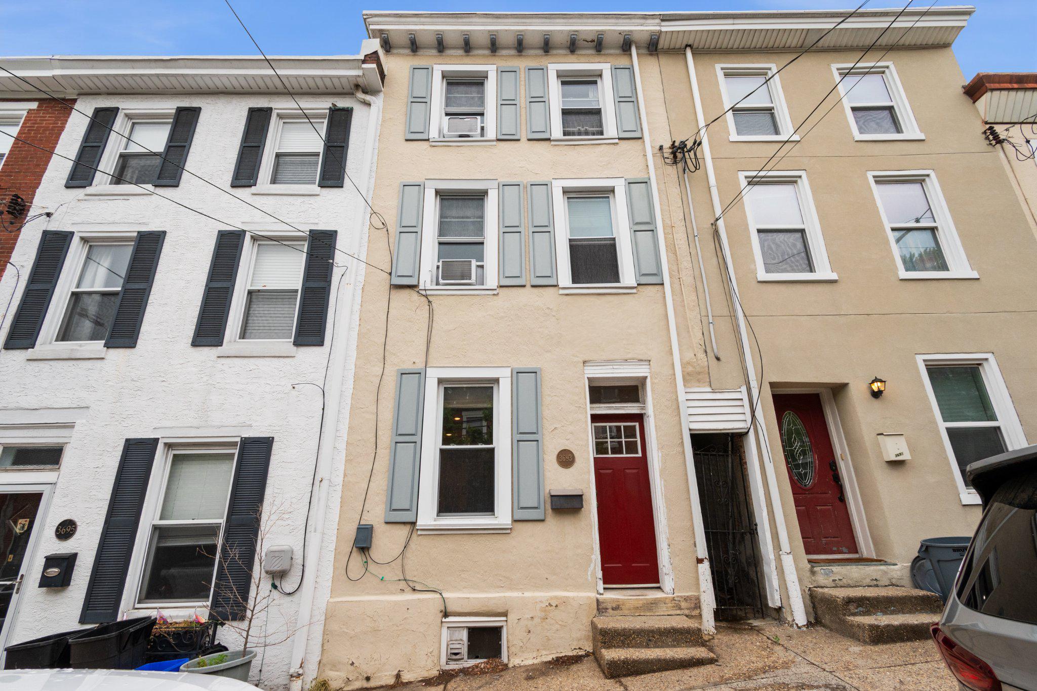 "At HOME" is how you will feel the moment you step into this expansive three-story, four-bedroom row home nestled in the heart of Philadelphia’s sought-after East Falls neighborhood. This residence offers a rare opportunity to build immediate equity; it is a canvas awaiting your personal touch. Perfect for the buyer looking to refresh the space with new paint, refinished flooring, and creative vision to make it shine. As you enter, you are immediately greeted by high ceilings and the parquet wood floors. The first floor layout flows naturally from the living room into a sizable dining room, which serves as the heart of the home and features a stylish-turned staircase. A passthrough cutout provides a visual bridge to the updated kitchen, creating a seamless environment for hosting friends and family.

The kitchen features ample cabinetry, gas range, refrigerator, ceramic tile flooring and backsplash and a wonderful bay window with spacious countertop just waiting for you to grow amazing herbs to add to your culinary masterpieces. Located just off the kitchen is your outdoor oasis. Step outside onto the patio which is a perfect place to grill some delicious meals and entertain your guests. Whether you are a gardener looking to have your own vegetables, plant beautiful annuals or simply prefer to relax in the wonderful garden, this backyard offers endless opportunities for tranquility and recreation.

The upper levels provide a flexible layout tailored for modern needs. On the second floor, you will find a large front bedroom with double windows that let in lots of natural light and ample closet space, a rear bedroom and an upgraded three-piece hall bath. The third floor completes the home with two additional sizeable bedrooms. Additional features include a mini-split in the dining room, windows replaced in 2007, water heater replaced in 2018 and a basement offering space for storage, mechanicals and laundry.

The East Falls community itself is a unique gem nestled along the banks of the Schuylkill River, offering a perfect urban-suburban lifestyle. It is centrally located for an easy commute to both Center City and the suburbs, with major roadways and the regional rail line just a few blocks away. The neighborhood is surrounded by lush parks and trails, including the famous Kelly Drive recreational loop and the six acres of open space at McMichael Park. Residents can enjoy a stroll to the Falls of Schuylkill Library to admire its Collegiate Gothic architecture or explore the nine acres of recreational space at the McDevitt Center. You are also just steps away from a vibrant collection of favorite local restaurants and coffee shops. Come see for yourself why this home, with its incredible potential and unbeatable location, is the perfect place to plant your roots.
