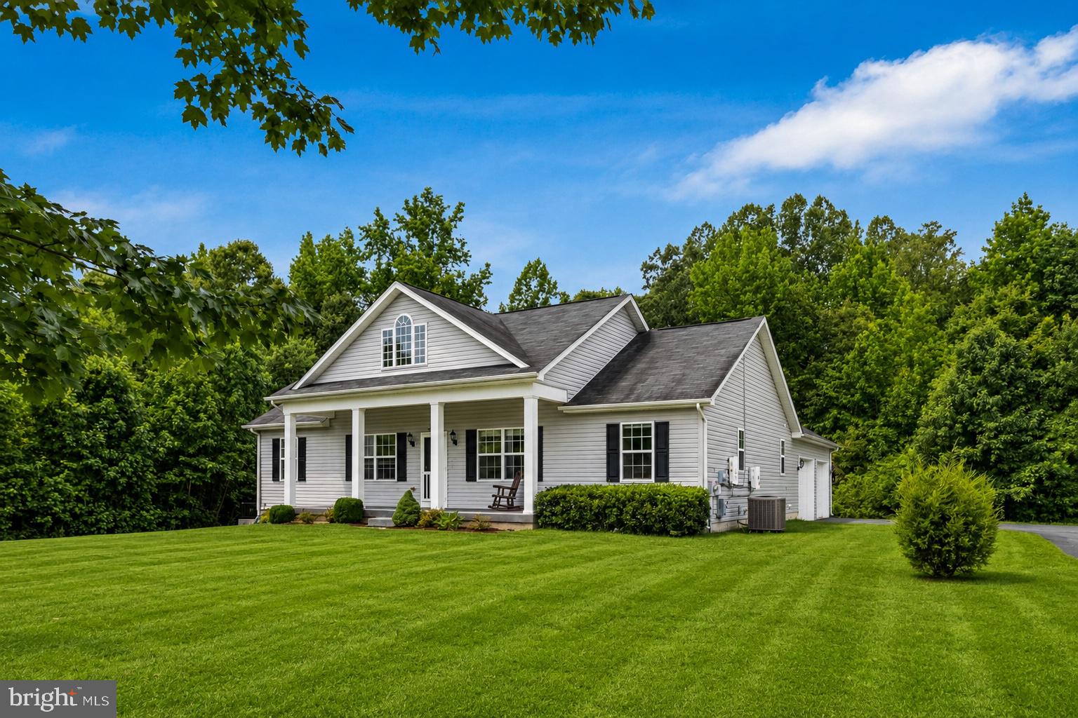Beautiful 3-bedroom, 2.5-bath rambler nestled on nearly an acre in the highly desirable Huntingtown community! This inviting home offers the ease of one-level living with an open, light-filled floor plan featuring vaulted ceilings, hardwood and ceramic tile flooring, granite countertops, stainless steel appliances, and spacious living areas perfect for everyday living and entertaining.
Relax on the welcoming covered front porch or unwind on the expansive rear deck overlooking the peaceful backyard. Additional highlights include a 2-car side-load garage, energy-efficient solar panels, and a full unfinished basement ready for your personal touch—whether you envision additional living space, a home gym, recreation room, workshop, or abundant storage.
Enjoy the privacy and space of nearly an acre while remaining just minutes from top-rated schools, shopping, dining, and convenient commuter routes. A rare opportunity to own a move-in ready home that offers comfort today and room to grow for years to come.