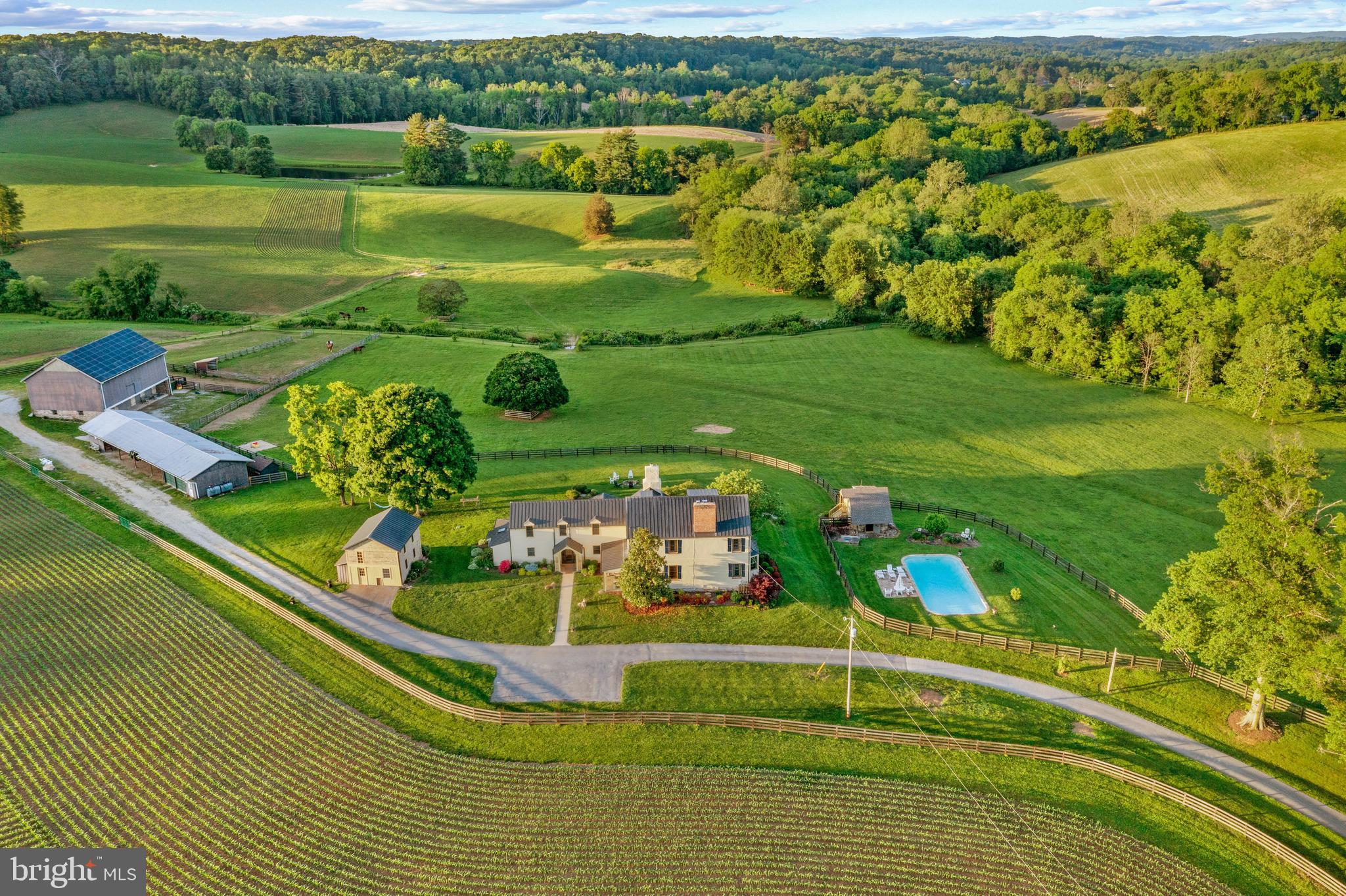 Welcome to Shoulderbone Farm – A Timeless Retreat

Nestled on 203 breathtaking acres, Shoulderbone Farm is a rare gem that seamlessly blends historic charm with modern luxury. This extraordinary property offers an unparalleled setting for horse and hound or those seeking a private country retreat.  

The farm’s equestrian facilities feature a large bank barn with a spacious hayloft, eight stalls, a run-in shed, and a utilities shed that includes a heated tack room with a sink, ample space for farm equipment, and a two-car garage.  An automatic water system  runs throughout.  Multiple jumps are integrated into the fencerows, and expansive level areas provide the perfect setting for schooling in carriage driving, mallet sports, dressage, or jumping. "The Little Deer Creek" meanders gracefully through the property, adding to its serene beauty.  

The residence is a striking blend of history and elegance. The six-bedroom, five-and-a-half-bath home features a newly renovated first-floor primary suite and an updated kitchen, both designed to honor the home's original character while embracing modern sophistication. The oversized sitting and kitchen area offer stunning, panoramic views of the pastures, creating a tranquil and inviting atmosphere. The original dining room, dating back to the 1700s, showcases a beautifully preserved fireplace, a testament to the home’s rich heritage. A charming spring house provides an additional private retreat, perfect as a reading nook or guest space with its own bath.  

Beyond the barns and pastures, the estate boasts rolling fields, scenic ponds, and extensive riding trails, inviting exploration and outdoor enjoyment. Whether you envision an active equestrian lifestyle or a peaceful countryside escape, Shoulderbone Farm presents a truly unique opportunity to own a piece of Maryland’s countryside legacy.