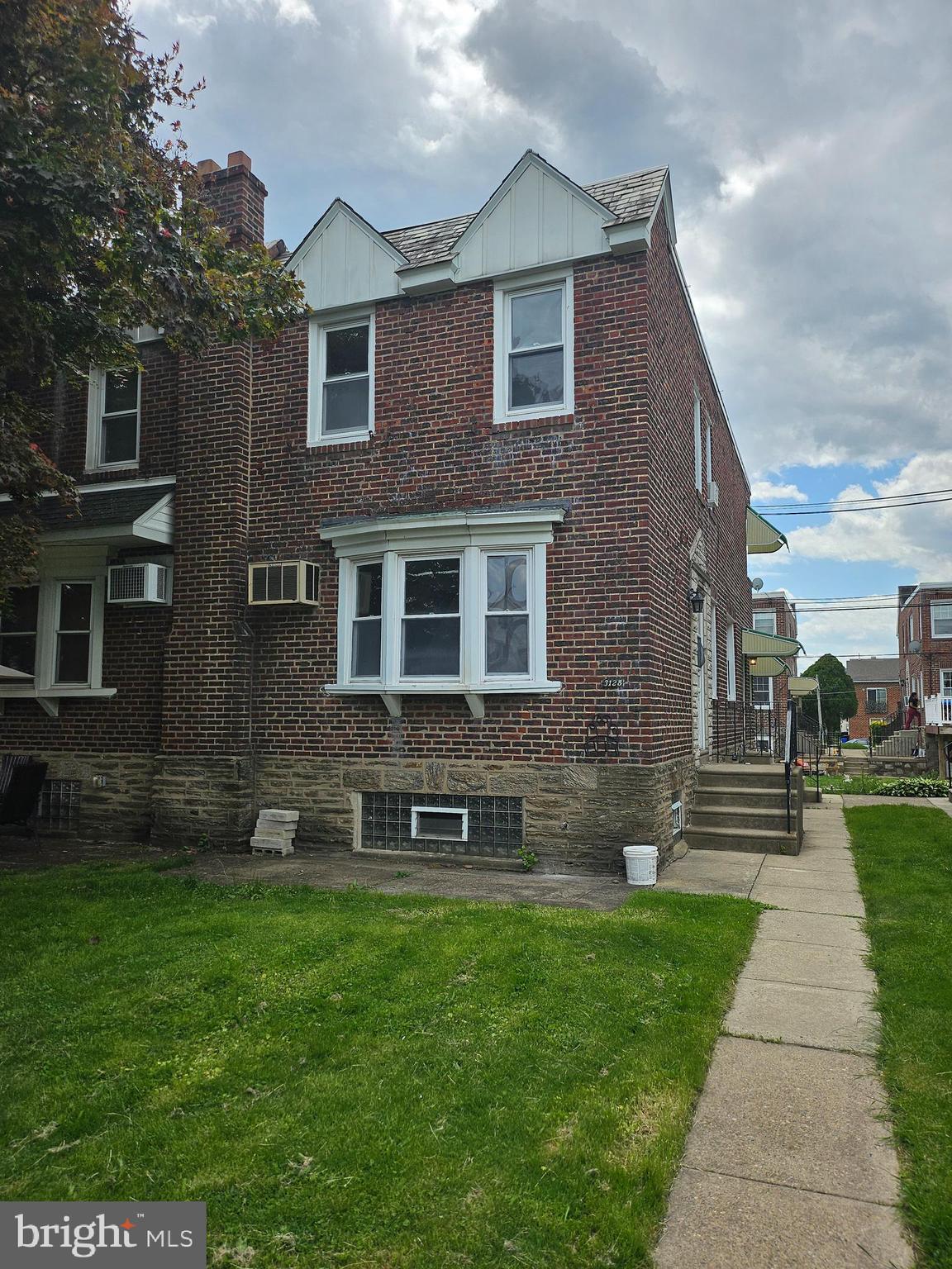 Welcome to 3128 Guilford Street. This well-maintained 3-bedroom twin home, featuring one full and two half bathrooms, is located in the desirable Sandyford Park neighborhood.
The main level offers spacious living and dining areas, an eat-in kitchen, and a conveniently located powder room. The kitchen features ample cabinetry, granite countertops, and stainless steel appliances. The upper level includes three bedrooms, each with generous closet space, and a full bathroom.
The finished basement provides a laundry room, a storage room or office, and a workout area. This level also includes an additional powder room and provides direct access to the driveway.