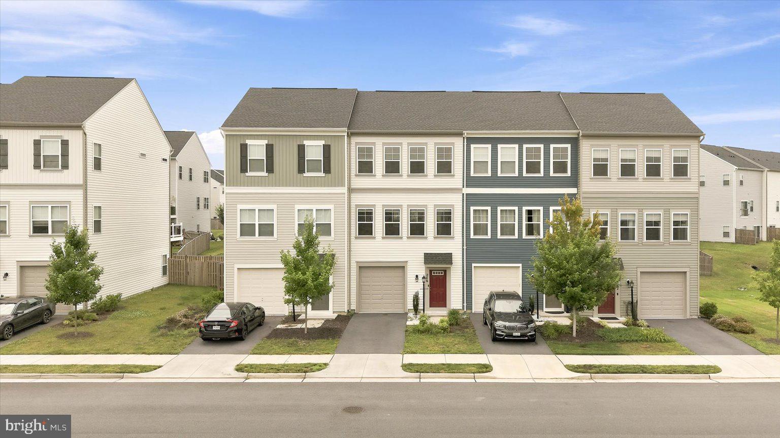 LOCATION LOCATION  LOCATION !!!!  In the sought-after resort-like community of Snowden Bridge, you'll have access to top-notch amenities .Step into comfort and style in this nearly new three-story townhome built in 2021. Boasting 3 spacious bedrooms and 2  bath, and an open-concept l flows from kitchen to dinning to living room with large windows, this home is perfectly designed for both living and entertaining. An oversized Island ideal for casual mornings or dinner parties