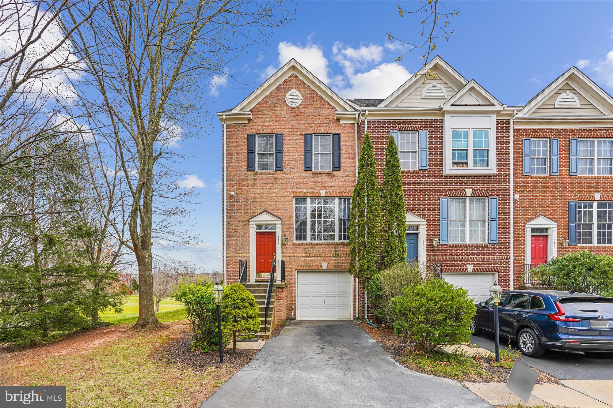 Stunning 3-Bedroom End-Unit Townhome in Gated Community! Enjoy breathtaking views of the golf course and mountains from this beautifully upgraded home. The fully renovated kitchen boasts granite countertops and elegant maple wood cabinets, while the spacious family room features a cozy gas fireplace—perfect for relaxing evenings. Gleaming hardwood floors span the entire main level, adding warmth and style. A walk-out basement offers additional space and flexibility. Parking is a breeze with a one-car garage and an extra designated spot in front of the driveway. Conveniently located near major commuter routes and shopping. Don't miss this exceptional opportunity!