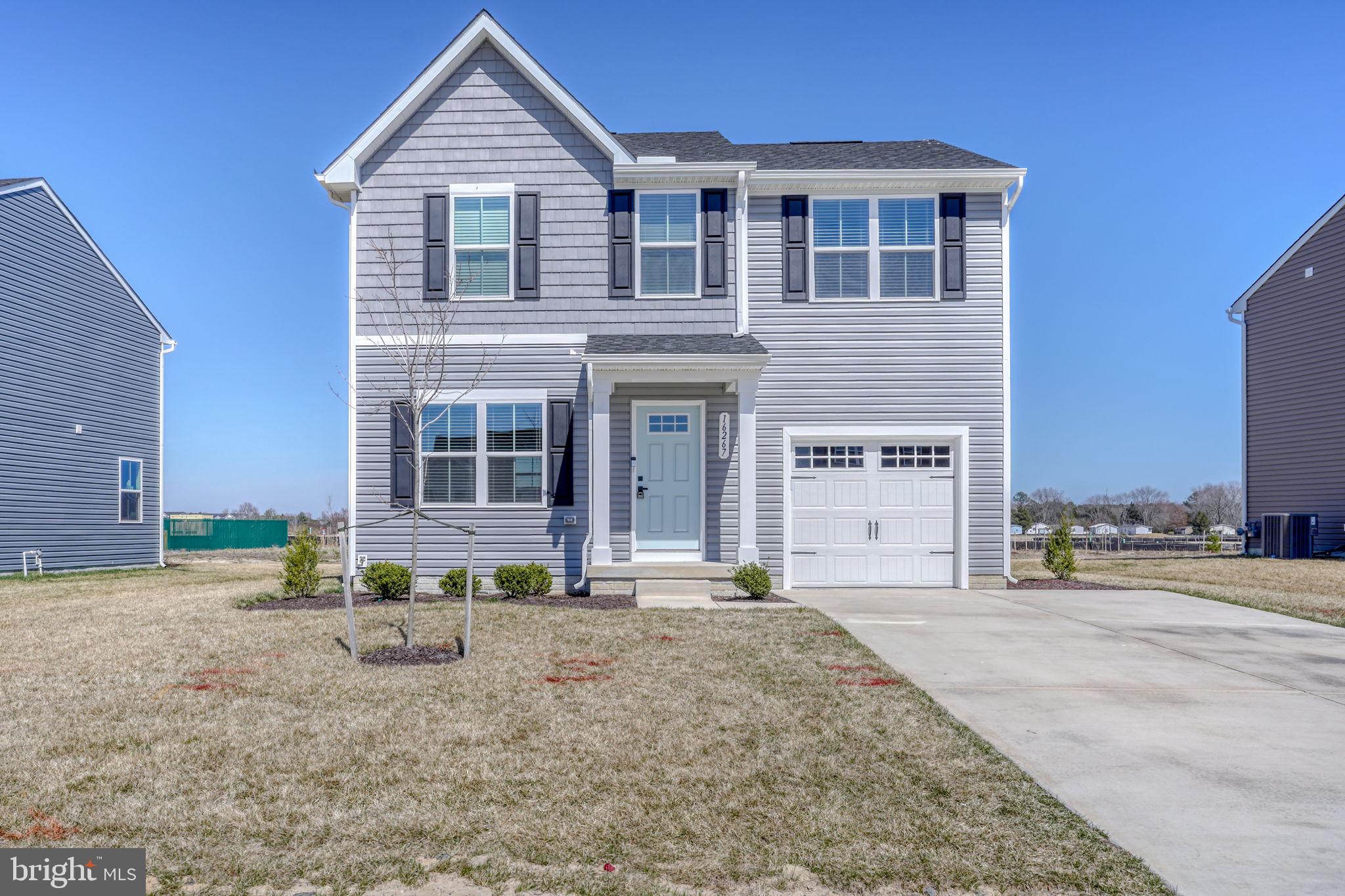 Welcome to 16267 John Adams — this beautiful home is practically brand new! Built in 2024, this Dogwood model is completely move-in ready and offers the perfect blend of modern design and comfort. This home features an open floor plan, perfect for spending quality time in the living room while enjoying the spacious kitchen. The full basement offers endless possibilities, and all 3 bedrooms are upstairs, making it ideal for families — plus the laundry is conveniently located on the same level. Step outside to a spacious backyard and enjoy the built-in irrigation system that keeps the lawn looking lush all season long. Location is everything! Located in the Patriots Glen community, you’ll enjoy great amenities including a community pool, fire pit, and neighborhood gathering areas just a short walk away. You’re also only minutes from everything the town of Millsboro has to offer — shopping, dining, and local favorites like Paradise Grill. Love the beach? You’re about 25 minutes from Rehoboth Beach and Dewey Beach, making this the perfect year-round home or coastal getaway.  Don’t miss your opportunity to own this sweet home.
Move-in ready — all it needs is your personal touch!