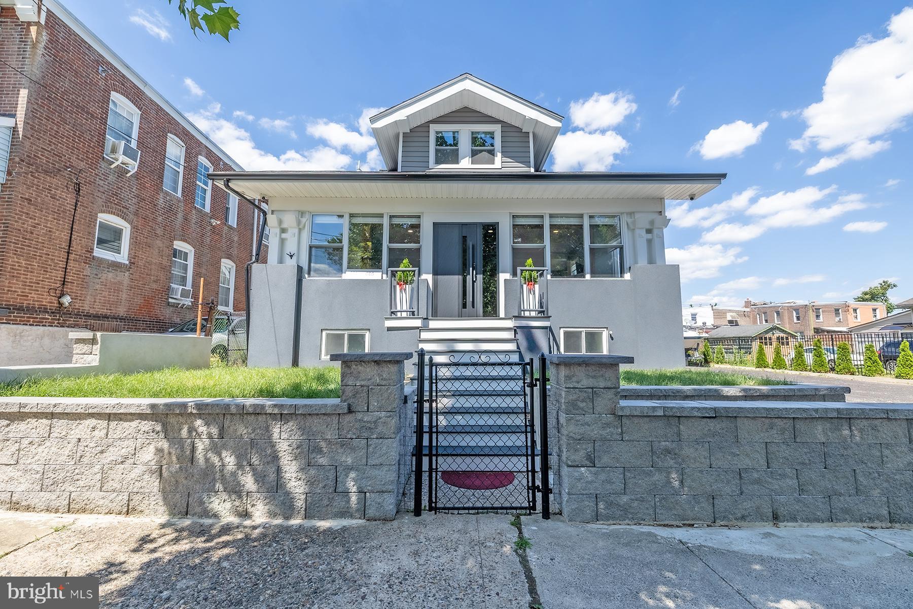 Welcome to 621 Gilham Street, a beautifully renovated home where quality craftsmanship and thoughtful design come together. This exceptional property is being sold together with the adjacent lot at 625 Gilham Street, offering additional outdoor space and future possibilities.

The home has undergone a complete renovation with permits, featuring professionally completed work and tasteful, modern finishes throughout. The main level offers a spacious primary bedroom, a full bathroom, and a convenient powder room, along with an inviting living area and a beautifully updated kitchen designed for both everyday living and entertaining.

The second floor features three generously sized bedrooms and a fully renovated hall bathroom, providing plenty of space for family, guests, or a home office.

The fully finished basement expands the living space with endless possibilities for a recreation room, media room, home gym, or guest suite. It also includes a full bathroom and a dedicated laundry area for added convenience.

Outside, the property is fully fenced, providing privacy, security, and a great space for pets, outdoor entertaining, or relaxing. A detached garage offers additional parking, storage, or workshop potential. Being sold together with the adjacent lot at 625 Gilham Street, this property offers a rare opportunity to enjoy an expansive outdoor setting with added flexibility.

Additional highlights include all-new systems, quality finishes, and attention to detail throughout the home. With the included adjacent lot at 625 Gilham Street, this is a rare opportunity to own a move-in-ready property with extra land in a desirable Northeast Philadelphia location.

Don't miss your chance to make this beautifully renovated home your own—schedule your private showing today!