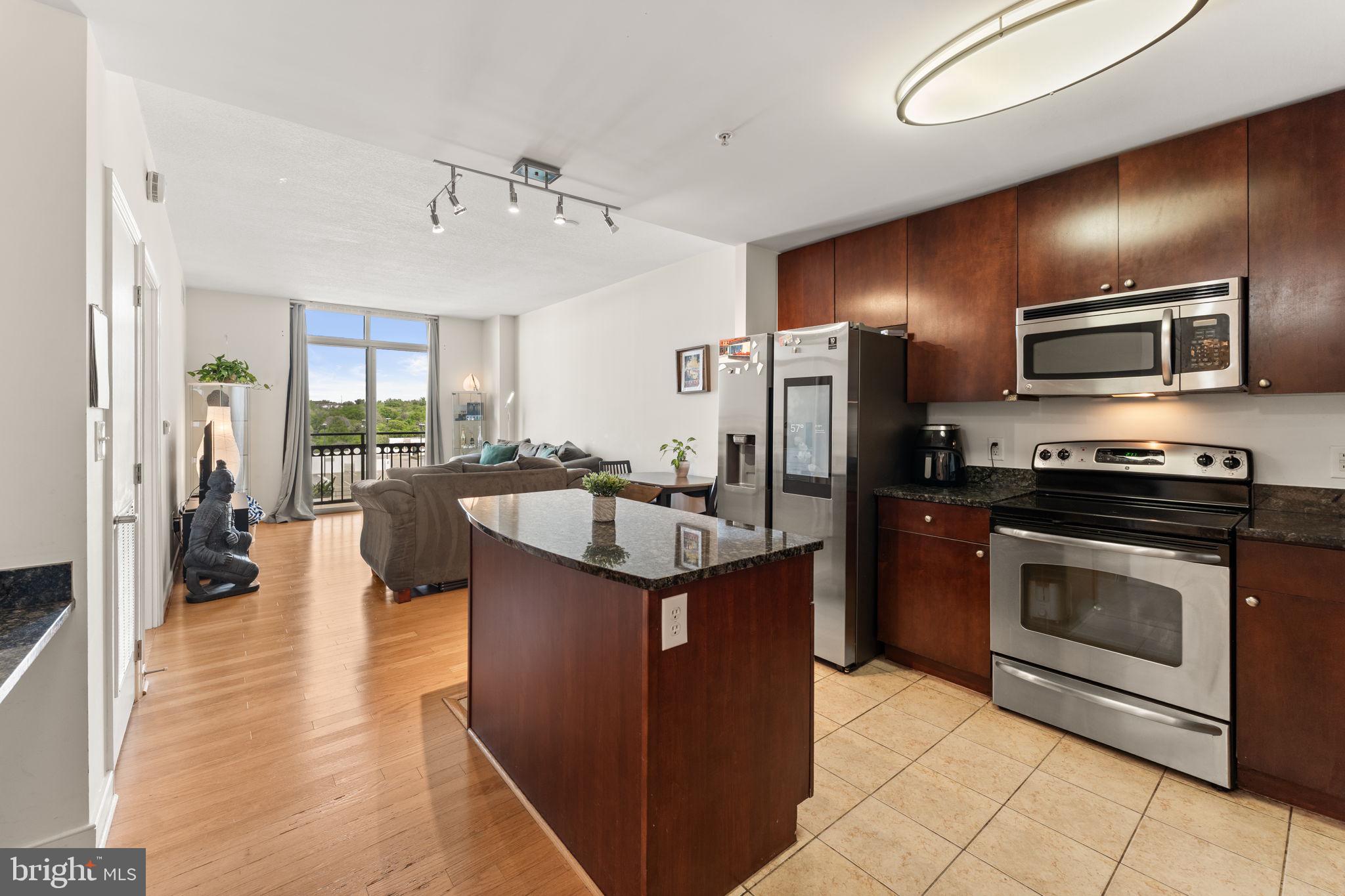 Welcome to this gorgeous 1BR/1BA residence in sought-after One National Harbor, priced to sell and move-in ready.  Great Views from the Kitchen, Living Area and Bedroom.
Located on the eighth floor, this beautiful condo offers stylish finishes including granite countertops, beautiful hardwood flooring, stainless steel appliances, upgraded refrigerator and an in-unit washer and dryer. The spacious layout features a bright living area, room for dining, and a generously sized bedroom with a large walk-in closet and access to the full bath. A premium garage parking space also conveys.
Enjoy resort-style amenities including a concierge desk, fitness center, clubroom with piano and pool table, mezzanine patio, rooftop pool, and observation deck with sweeping views of the capital wheel, Potomac River, Woodrow Wilson Bridge, Alexandria, and Washington, DC. Located in the heart of National Harbor, you are just minutes from shopping, dining, MGM, National Airport, Metro access, 
and Andrews and Bolling Air Force Bases..