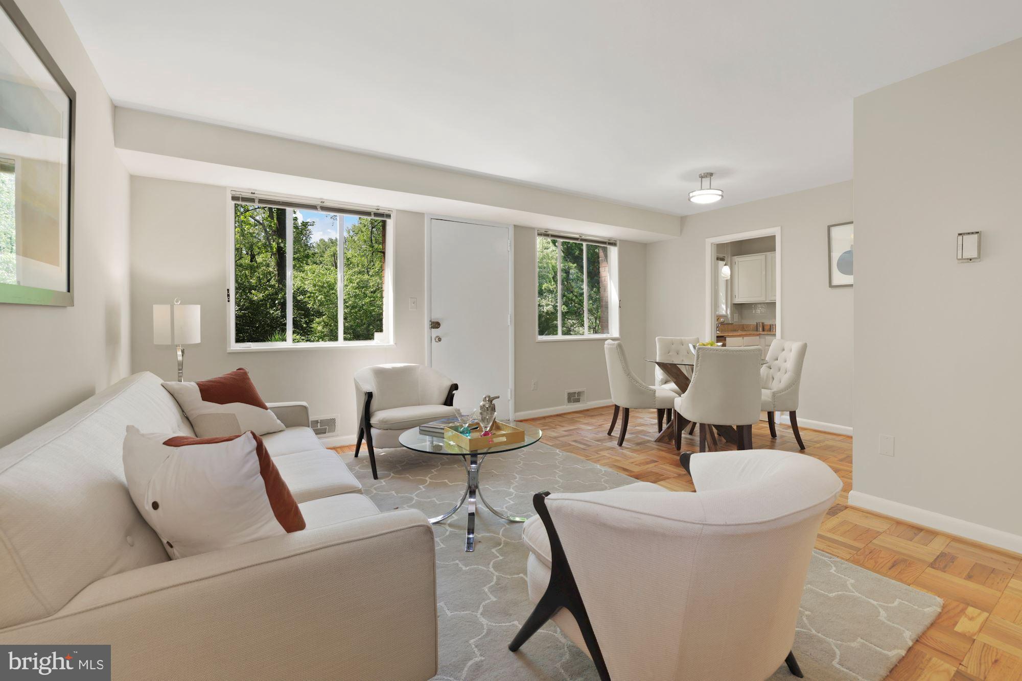 NEW PRICE!! Rarely available 3 bedroom, 1 bathroom condo with private outdoor patio that overlooks mature greenery in the award-winning Parkside Condominium community. The patio door provides a 2nd alternative entry to the home, conveniently located close to the parking lot and one of the closest units to the community pool, tennis courts, and more. Recently refreshed, this home has new paint throughout including kitchen cabinets, new light fixtures, and newly refinished parquet hardwood floors. Large South-facing windows throughout the unit overlook the mature trees and greenery. The open concept living and dining room have the perfect flow for entertaining or easy living. The updated kitchen has glass tile backsplash, granite countertops, and stainless steel appliances. Three bedrooms - an oversized primary plus two additional spacious bedrooms which can be used for guests, home office, and/or den. Common laundry and storage rooms are conveniently located on the same level. The Parkside community is spaced over 69 acres of land and conveniently located in Bethesda near I-495, the Grosvenor-Strathmore Metro, Strathmore Music Center, and Westfield's Montgomery Mall. The 69 acres of land that the community encompasses allows for many great walking paths, bike trails, ballfields, pools, tennis courts, clubhouses, and more, all just outside your front door. Condo fee includes all utilities (except cable).