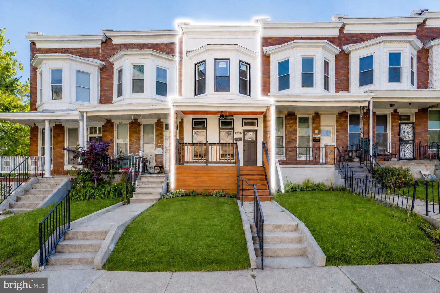 Stunning Fully Renovated 3-Level Home in Baltimore! This beautifully updated 3-bedroom, 3-bath residence offers exceptional finishes, thoughtful design, and brand-new mechanical systems for total peace of mind.

Step inside to an open and bright main level featuring new flooring, recessed lighting, and a stunning fireplace that instantly elevates the living space. The kitchen is a true showstopper, featuring a gorgeous quartz countertop that extends up the wall to the slab backsplash, stainless steel appliances, and modern cabinetry—perfect for both everyday living and entertaining.

Upstairs, you'll find bedrooms filled with natural light and a beautifully updated full bathroom. The fully finished lower level expands your living possibilities with a second living area, laundry area, and a second full bathroom—ideal for a media room, home gym, or flex space. The rear outdoor space is fenced in and could easily be converted to a parking pad. A modern covered front porch adds curb appeal to this classic Baltimore rowhome.

Major upgrades include new flooring, a new HVAC system, new water heater, new electrical, and updated plumbing, ensuring efficient and worry-free living for years to come. Rest easy knowing all permits were pulled on this exceptional renovation.
Homes with this level of quality don't come around often—secure your showing, bring your best offer, and make this standout property yours before someone else does.