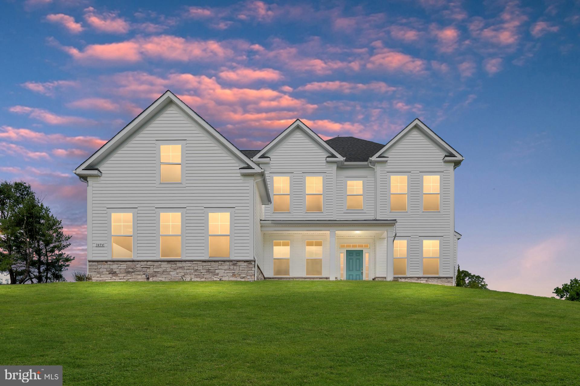 Move-in ready and beautifully positioned on 3.12 private acres, this new construction home offers luxury, space, and convenience in a sought-after location just off Route 15 with easy access to shopping, dining, I-66, Loudoun County, and Western Prince William County. Boasting nearly 5,000 finished square feet, this home features 6 bedrooms, 5 full bathrooms, a 3-car side-entry garage, and thoughtfully designed living spaces throughout.

The main level showcases a chef’s kitchen with a large center island, quartz countertops, creamy off-white cabinetry, apron sink, sun-filled morning room, and a butler’s pantry connecting to the dining room. The dramatic two-story family room features a coffered ceiling and floor-to-ceiling stone fireplace. A private study, convenient mudroom with built-in cubbies, and main-level bedroom with full bath provide flexibility for guests and everyday living.

Upstairs, the luxurious primary suite offers a sitting area, oversized walk-in closet, and spa-inspired bath with a soaking tub and frameless shower. Three additional bedrooms, a buddy bath, hall bath, and a convenient laundry room complete the upper level. 

The finished walk-up lower level includes a spacious rec room, a bedroom with a full bath, and abundant storage. Enjoy peaceful outdoor living from the rear deck overlooking your private acreage, with plenty of room for a future pool or patio. Luxury finishes, privacy, and immediate availability make this home a rare opportunity.