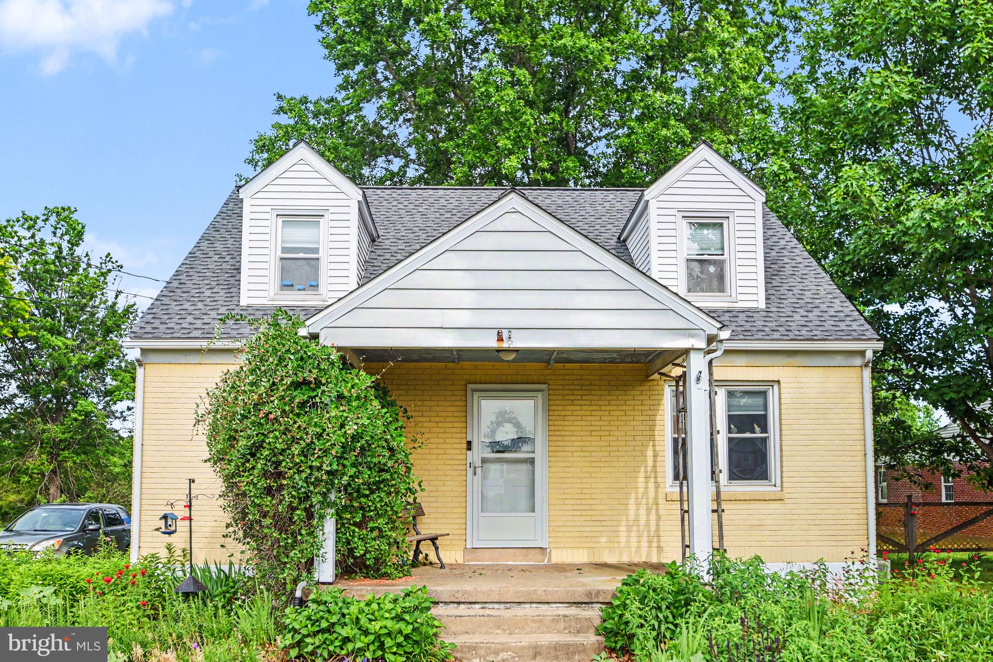 Wow, what a great opportunity to own a single home on a large flat lot.  The location is amazing and this house backs to township protected open space.  This  4 bedroom home offers a first floor full bathroom, great for one level living.    All of the rooms are a great size and filled with sunshine.  Hardwood flooring adorns much of the house.  The kitchen is large and overlooks an expansive rear yard.  The basement has  an outside walk up entrance  and makes a great workshop and storage space, or can be finished for a family room, gym, etc..  NEW roof in 2024 and NEW hot water heater in 2022.    This home has been loved and cared for by long term owners, however is in need of some TLC, and is being sold as-is.