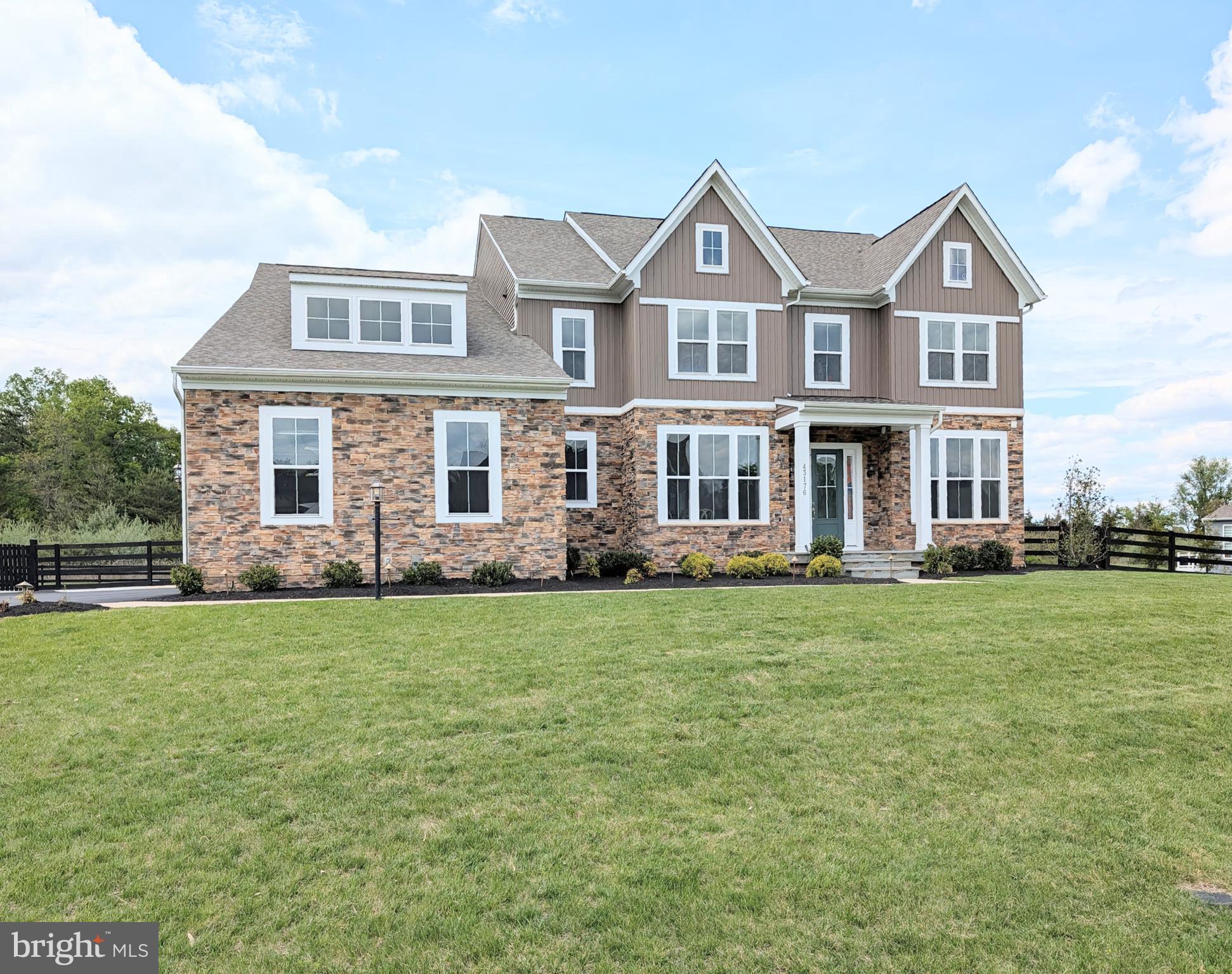 Exceptional Stanley Martin Landon in Reserve at Holly Springs with nearly 7,600 finished sq ft on a rare 0.80-acre homesite backing to woods with additional wooded privacy and no direct neighbor on one side. This heavily upgraded 6-bedroom, 6.5-bath home delivers luxury scale, privacy, and true indoor-outdoor living, with over $250,000 in thoughtfully designed post-build improvements focused on outdoor living, entertainment, and premium finishes. The main level features custom 9-foot interior doors, 7-foot windows, extensive recessed lighting, coffered ceiling, fireplace, elegant gallery-style flow, formal dining, private study, and a main-level bedroom suite with upgraded full bath, standing shower, and frameless glass door. The gourmet kitchen includes upgraded cabinetry, quartz countertops, upgraded diagonal backsplash, cabinet lighting above, below, and inside, large island, oversized pantry with outlets, and a custom butler’s pantry with solid stained maple built-ins, quartz counter, and beverage cooler.

The upper level offers a spacious owner’s suite with large sitting area, oversized walk-in closet, and upgraded spa-style bath with Level 4 tile and large walk-in shower. Three additional upper bedrooms, upgraded baths, laundry, upper flex space, premium ceiling fans, blinds, and added recessed lighting complete the level.

The finished walk-up lower level is built for serious entertaining and everyday flexibility, with an L-shaped wet bar, cabinetry, sink, full-size refrigerator, beverage cooler, large recreation areas, finished bedroom/gym with insulated ceiling, walk-in closet, upgraded bath, secondary media space, and a fully sound-isolated Dolby Atmos theater with sound shakers, 15 speakers, and 2 subwoofers.

The exterior is a standout: approximately 2,000 sq ft thermal full-color flagstone patio with custom brass stone propane firepit, reinforced slab, accent lighting, hardwired app/voice-controlled string lighting, brass step lighting, additional exterior lighting, extensive outdoor electrical/water/LAN wiring, 11-zone Rachio irrigation, privacy landscaping with Thuja Green Giants, 445 linear feet of pool-compliant fencing with wire mesh, professionally installed gutter guards with exterior vent guards, and professionally finished full-flake epoxy garage flooring.

Enjoy quiet evenings outside with a drink, listening to birds and taking in the wooded backdrop, or gather for s’mores around the propane firepit without worrying about smoky clothes.

A rare combination of luxury finishes, premium systems, usable space, privacy, and outdoor living in one of the area’s most impressive homes.