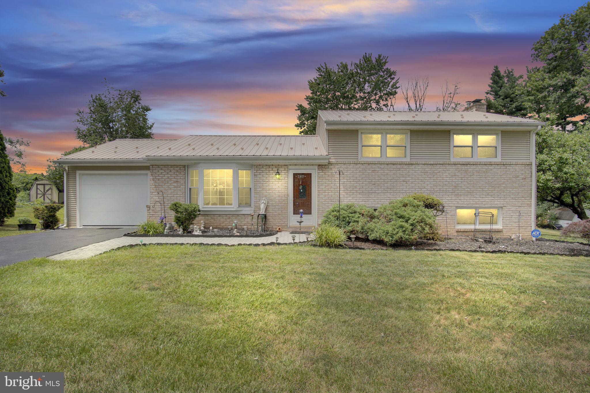 Welcome home to this highly sought-after Upper Allen Township Kim Acres neighborhood! Perfectly situated and beautifully maintained, this 3-bedroom, 2-full-bath split-level home is completely ready for you to move in and start making memories.

Extensive recent updates offer excellent peace of mind, including a 1.5-year-old metal roof, a newer furnace, and a recently replaced garage door, driveway, and oversized composite deck.

Inside, the inviting living room features a large bay window that fills the space with natural light, complemented by custom window treatments throughout the home. The spacious kitchen boasts abundant cabinetry for all your cooking essentials, while the charming dining room features a sweet built-in corner cabinet. From the dining area, elegant French doors lead out to the oversized deck—perfect for outdoor dining and entertaining.

The lower level adds fantastic functional space with a comfortable family room featuring a wood-burning fireplace, an attached second full bathroom, a laundry, and backyard access.

Outside, the large, level lot offers endless possibilities and is tastefully landscaped for easy, low-maintenance care, turning your yard into a private oasis.

Located in a fantastic community with a neighborhood park, shopping, and dining just minutes away, this home is also close to Messiah University and Mechanicsburg Schools. Commuting is a breeze with easy access to Route 15, the PA Turnpike, and major regional highways.