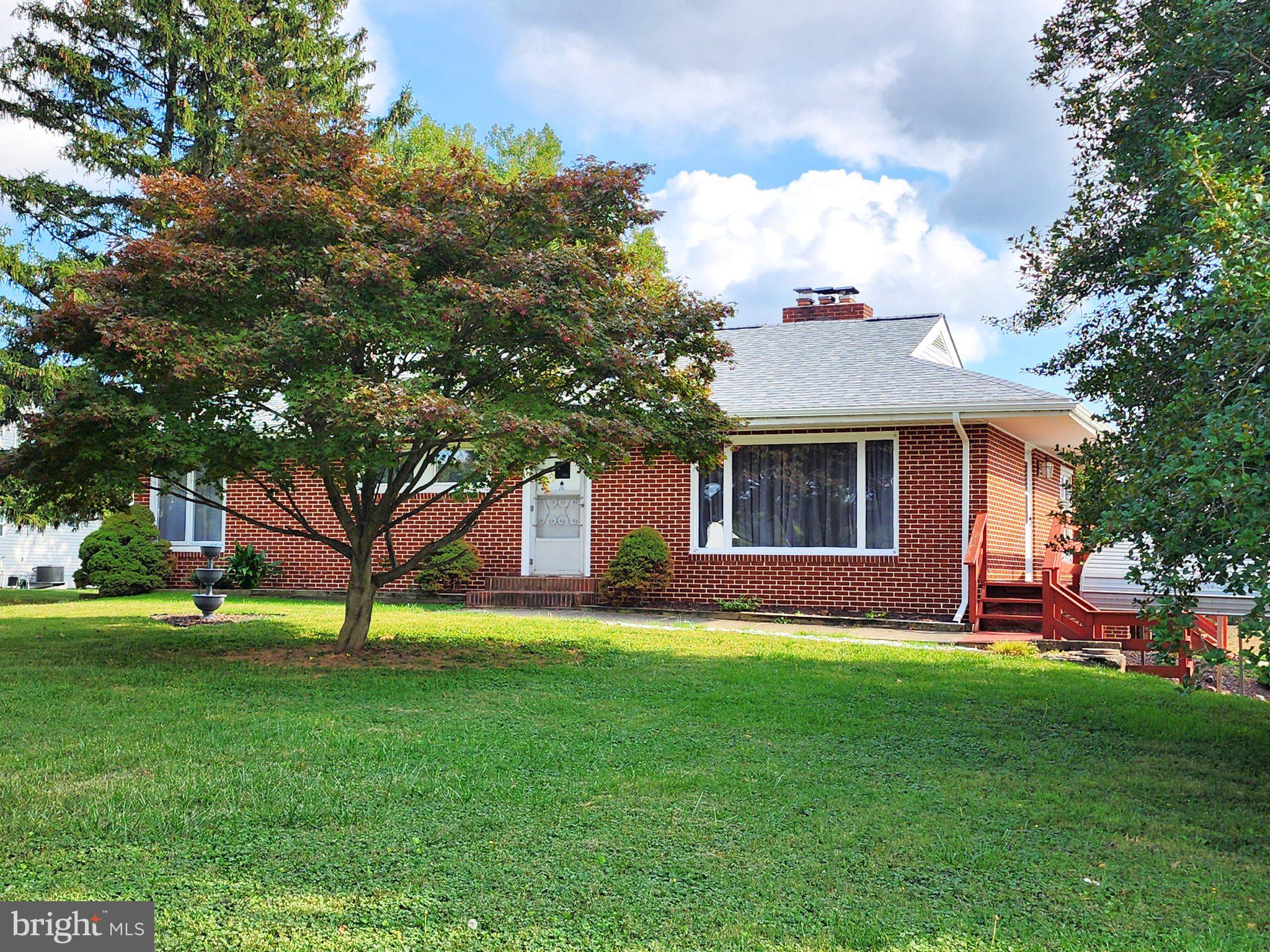 Discover the charm of this delightful raised ranch nestled in the serene community of Jarrettsville. Set on a generous 0.84-acre lot, this home offers a perfect blend of rural tranquility and modern convenience. With a newer roof and 2,092 sq. ft. of finished space, this residence features three spacious bedrooms and two full bathrooms, ideal for comfortable living. Step inside to find a cozy ambiance highlighted by an inviting brick fireplace, perfect for gathering with those important to you. The kitchen boasts essential appliances, including a built-in microwave, dishwasher, refrigerator and, stove.   The lower level offers a family room, full bath, a bonus room to use as needed, laundry/utility room and large storage area.   The detached carport and paved driveway offer ample parking for you and your guests.   Enjoy outdoor living on the expansive deck, where you can soak in the peaceful surroundings.  Jarrettsville is more than just a location; it's a vibrant community.  With a strong sense of community, neighbors often come together for local events and gatherings, fostering lasting friendships.   Conveniently located whether you are headed to Bel Air, Towson or Pennsylvania.   Embrace the lifestyle you've always dreamed of in this charming home, where comfort meets community. Don't miss your chance to make this gem your own!