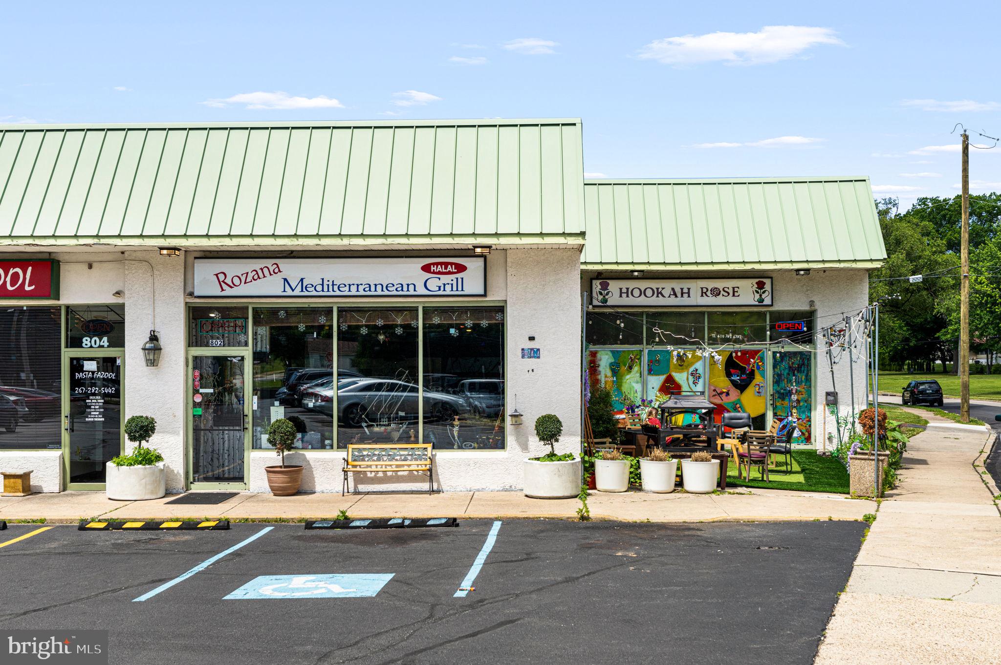 Two  adjoining businesses for sale (together or separately) - a profitable, vibrant Mediterranean  Restaurant- 40 seats, full kitchen, loyal customer base   
AND A Magical HOOKAH BAR, with appropriate licensing and endless possibilities, complete with multiple TV screens for watching sports and elaborate imported hookah equipment. 
10 lease option possible.