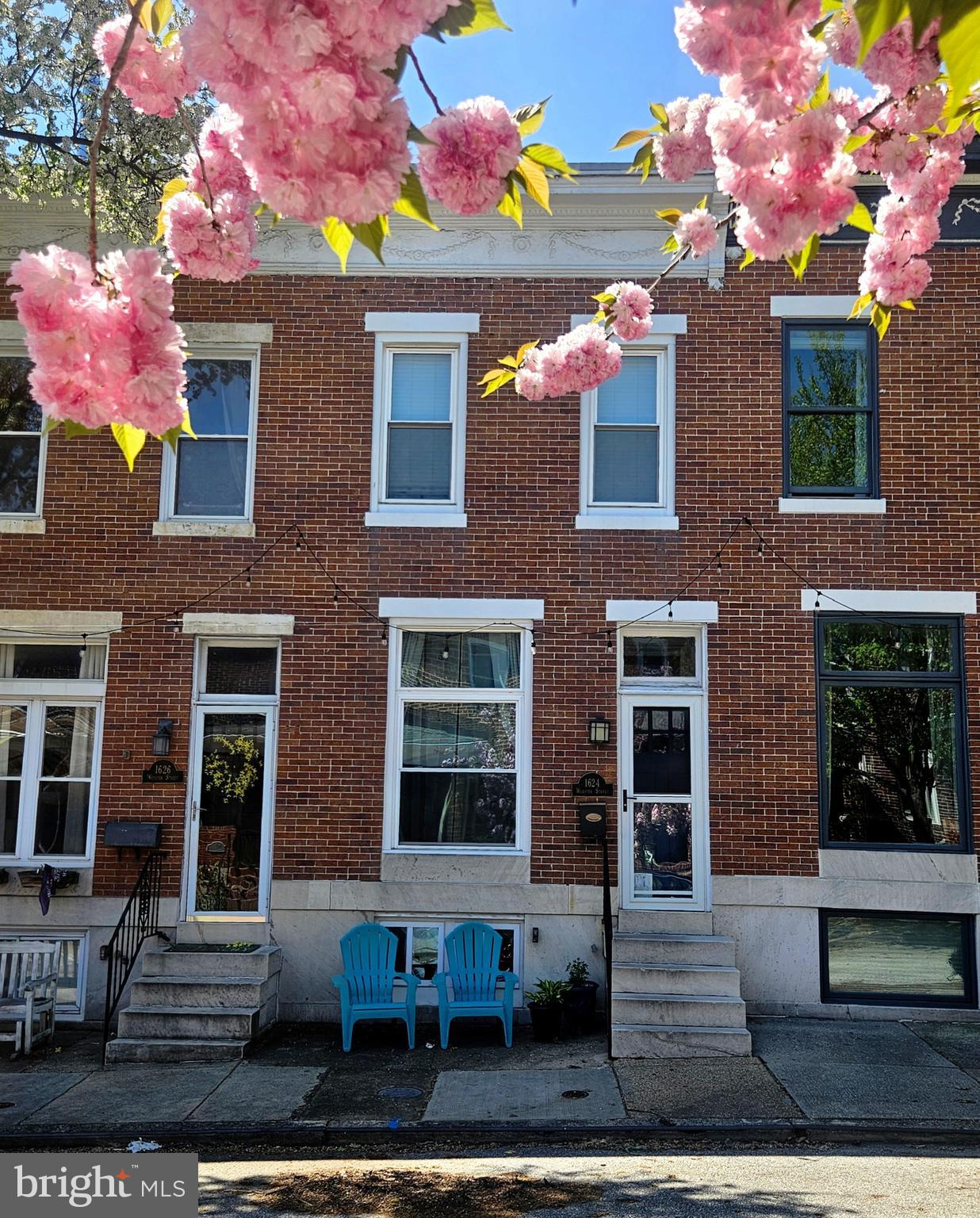 Welcome to 1624 Webster, a well thought out home with custom changes and TONS of upgrades! This home is conveniently located one block from Southside Marketplace and on one of Federal Hill's most desired streets (with its own Facebook page) in the Riverside neighborhood.  Enjoy a maintenance free home with major systems replaced in 2024 including the gas furnace (Trane), AC Compressor & hot water heater!  The majority of windows were also replaced around 2023 including a custom removable front window to ease the process of moving large pieces of furniture in and out of the home. Beautiful gleaming oak hardwood floors extend from the living room into the dining room enhanced with crown moulding and chair rail, and complemented with elegant arches and decorative ceiling tile that enhance the historic charm.  The spacious renovated kitchen is a pleasant surprise with a generous amount of cabinet and counter space.  Highlights of this beautiful kitchen include 42-inch shaker style medium gray cabinets, quartz countertops, glass mosaic backsplash, tin ceiling tiles, stainless steel appliances including a gas stove and range hood and modern style ceramic tile flooring.  The large windows provide wonderful lighting in the kitchen and a rear door leads to the fenced in backyard with a newly installed patio area ideal for entertaining.  

As you venture to the upper level on the recently installed risers and treads, you will encounter a light switch on the banister that lights up the sizable upper-level landing.  This spacious area is currently used as an office and sitting area and offers an abundance of light streaming in from the skylight (replaced in 2014).   Two large bedrooms are at opposite ends of each other with luxury vinyl plank flooring.  The primary bedroom offers a stunning built-in accent wall featuring an electric fireplace with floor-to-ceiling stone, a shiplap ceiling and an abundance of closet space making this truly a wonderful place to retreat!  The bathroom was thoughtfully reconfigured from a crammed tiny bath to a generous size bathroom offering a double vanity, full size bathtub and shower, and ample storage. This is also the location of the home’s second skylight providing wonderful lighting to this area.  The second bedroom is a nice size and features another large closet and an additional rear extended closet (perfect for seasonal clothing).

The full-sized walkable basement is unfinished and awaiting your personal touches.  One room is currently used as a workout area while another area is partitioned with cedar boards for storage.  The basement also offers a section that is currently organized as a workshop with pegboards and shelving.  A full-size washer and dryer also convey! This home has been meticulously maintained by its current owner and is awaiting its next owner who will love its charm and ideal location!

Parking is readily available and this home is mere blocks from Riverside park!  Not to mention a stone’s throw to Giant, Starbucks, dining options as well as minutes from the Inner Harbor with its vast array of local bars, restaurants, shops and more.  Easy commute to Hopkins, UMAB, Mercy, & more as well as quick access to commuter routes I-95, 295, 83 and 695.  Perfect for the buyer looking for walkability, accessibility and who wants to be part of a vibrant community. *Please view 360 Photo Tour*