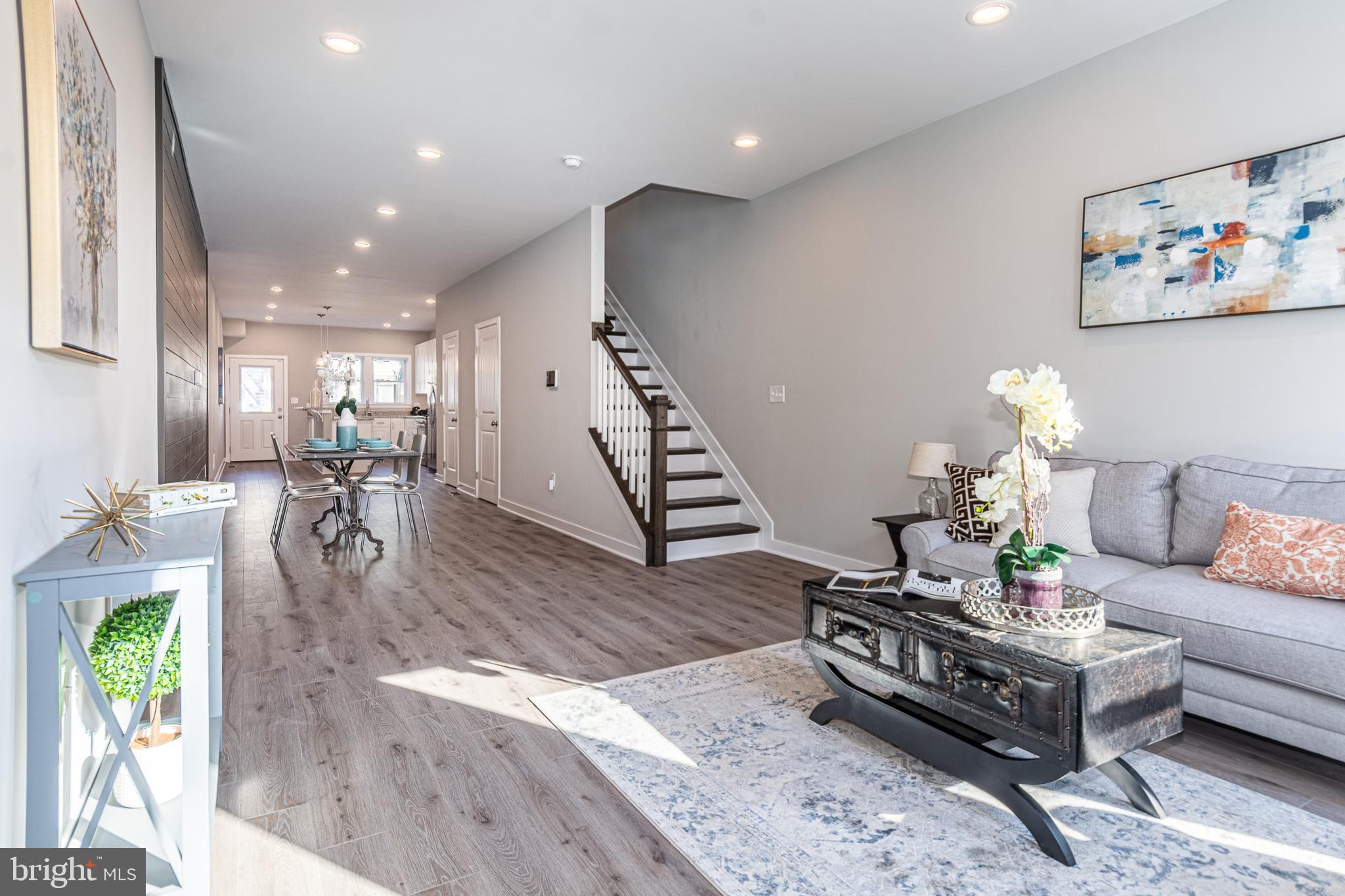 INTRODUCING UPTON GATEWAY - MAKE HOME OWNERSHIP A REALITY! LUXURY RENOVATIONS WITH OVER 100K OF POSSIBLE BUYING INCENTIVES THAT MAKE OWNING A HOME MORE AFFORDABLE THAN RENTING! Standard features include 3 finished levels, wood floors throughout the main level and hallways, carpet in bedrooms, kitchens with 42" cabinets, Frigidaire ss appliance package, and granite counters. Main level with an open floor plan featuring a spacious living room, separate dining area, and kitchen, upper level Primary bedroom suite with full bath and walk-in closet and a 2nd bedroom with a hall bath and bedroom level laundry, 3rd level with 3rd bedroom and a family room, and 2 car off street parking! Tons of buying incentives including 60K Upton Grant, 10K Vacants to Values grant, 25K Live Near You Worship Grant, and a $2,500 lender credit when you use the preferred lender! Pictures are of a finished home in Upton Gateway