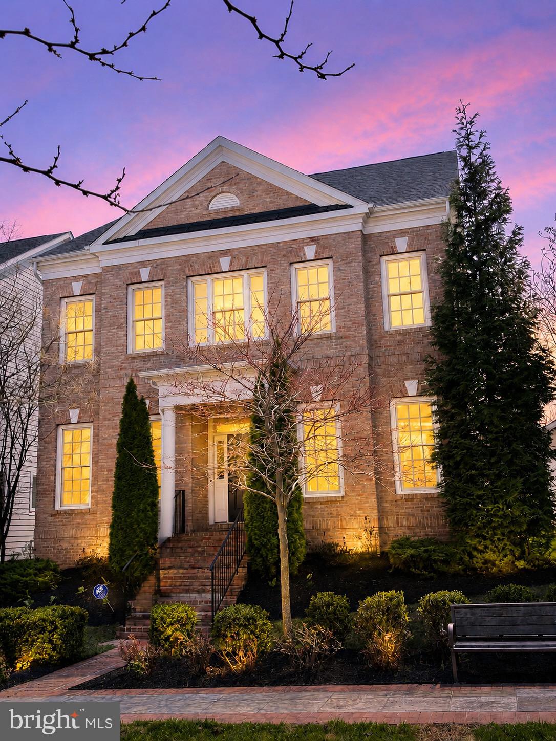 OPEN HOUSE SUNDAY 6/7 1-3 PM!! 
An Unparalleled Lifestyle of Luxury and Convenience in Bethesda Mews

Discover the pinnacle of sophisticated living in this exquisite 2017 brick-front Colonial, masterfully crafted by the award-winning Michael Harris Homes. Nestled in the coveted, maintenance-free community of Bethesda Mews, this residence offers a harmonious blend of classic elegance and modern comfort, designed for those with discerning taste.

From the moment you step inside, the home impresses with its soaring high ceilings and intricate crown molding, creating an air of grandeur. The thoughtfully designed main level is perfect for both grand-scale entertaining and tranquil daily life. A private home office provides a quiet space for productivity, while the expansive family room, anchored by a cozy gas fireplace, serves as the heart of the home. This inviting space flows seamlessly into a gourmet kitchen, equipped with professional-grade Viking stainless-steel appliances, and a bright eating area. Oversized windows bathe the space in natural light and offer serene views of the private deck and park-like, HOA-maintained green space beyond—a perfect backdrop for morning coffee or evening relaxation.

The upper level is a private sanctuary featuring four generously sized bedrooms and three beautifully appointed baths. The sumptuous primary suite is a true retreat, boasting a man-sized walk-in closet and a separate, room-sized private dressing area. Indulge in the spa-inspired master bath, complete with a steam shower, a luxurious soaking tub, a double vanity, and a spacious linen closet.

The fully finished lower level significantly extends the living and entertaining space. This versatile area includes a large guest bedroom, a full bath, a dedicated home gym with TV, a spacious recreation room ideal for a playroom or media center, and ample finished and unfinished storage areas.

Living in Bethesda Mews means embracing a carefree, "lock-and-go" lifestyle. The homeowners' association handles all exterior maintenance, including landscaping and snow removal, freeing your time to enjoy the things you love. The community itself features unique landscape spaces, including pathways and creative play areas.

Perfectly positioned for ultimate convenience, this home is just moments from the National Institutes of Health (NIH), the vibrant shops and restaurants of downtown Bethesda, and major commuter routes like I-495 and I-270. Enjoy the walkability and energetic feel of one of the DC area's most sought-after suburbs, offering the perfect blend of city convenience and suburban comfort. This exceptional residence delivers an unmatched combination of luxury, location, and lifestyle.