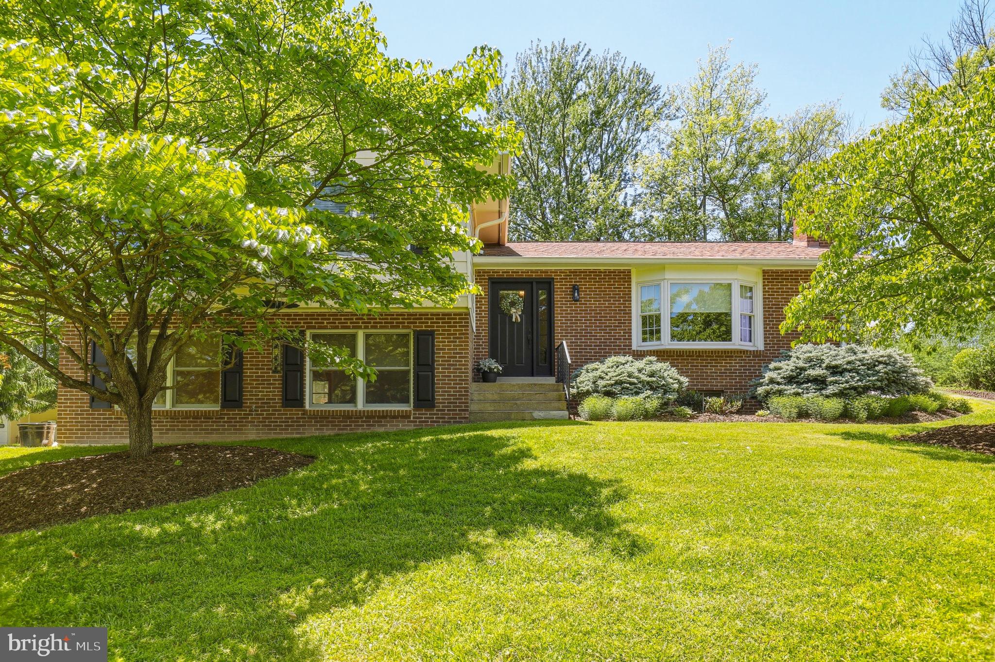 Need room for hobbies, vehicles, toys, or a workshop? This property delivers. Discover the space and flexibility you've been searching for on 2.23 acres across two separate parcels! This split-level home offers 2,378 finished square feet with 3 bedrooms, 3 full baths, and a detached 30x40 heated garage with electric and plumbing lines already in place—perfect for car enthusiasts, contractors, hobbyists, or workshop space.   Inside, enjoy a spacious primary suite, a remodeled kitchen, a wood-burning fireplace, and multiple living spaces designed for everyday comfort. Relax outdoors on the covered deck or walk-out patio overlooking the property. Major updates include HWH (2026) one of the two HVAC systems for the main and upper level (2022), roof and gutters with 50-year architectural shingles (2018), replacement windows and doors by Renewal by Andersen, updated primary bath vanity, fresh paint, some new carpeting, and more. Plus, two additional sheds offer even more storage and possibilities.