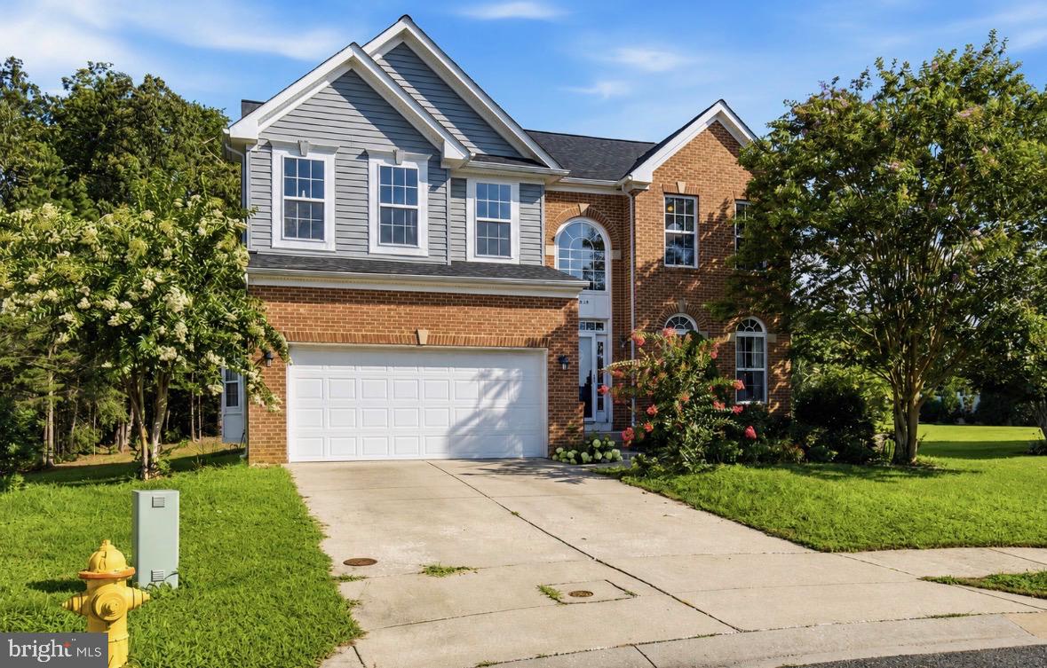 Welcome home to 46115 Salt Marsh Court, a beautiful three-level residence tucked away on a quiet cul-de-sac in the highly sought-after Westbury community of Lexington Park. Offering the perfect blend of space, comfort, and versatility, this impressive home features 4 bedrooms, 4.5 bathrooms, and the potential for a 5th room with a generously sized main level room ideal for a guest suite, home office, or flex space.

Step inside to a grand two-story foyer and discover spacious living areas designed for both everyday living and entertaining. The heart of the home is the expansive kitchen, which opens to a large family room, complete with a cozy gas fireplace. Upstairs, the luxurious primary suite offers a private retreat with an ensuite bath, while a second bedroom also features its own ensuite, providing comfort and privacy for family or guests.

The finished walkout basement adds even more living space, while the backyard backs to peaceful greenery, creating a tranquil setting to relax and unwind. Additional highlights include a two-car garage, roof replaced in 2022, and HVAC/air conditioning system replaced in 2025. Conveniently located near shopping, dining, schools, and PAX River Naval Air Station, this exceptional home is one you won't want to miss.