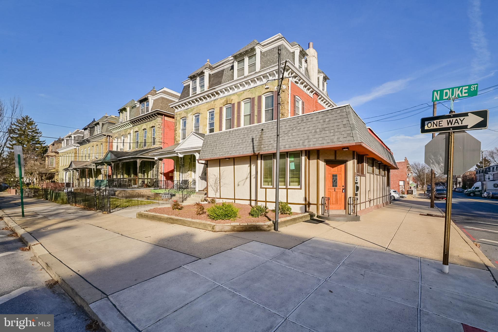 Exceptional mixed-use opportunity in the heart of Lancaster City. 

This well-maintained 4792 sq ft corner property offers unmatched flexibility, visibility, and income potential. Ideal for an owner-occupant, investor, or business seeking a high-profile location, the property includes a beautifully updated first-floor unit with many options for use, plus 2 additional apartments.
The center of the property is a beautifully renovated, Handicap accessible primary residence encompassing approx 1600 sq ft on Main level. Thoughtfully designed for comfort and entertaining, the residence features stunning new Kitchen, newly renovated Full Bath, 2 Powder Rooms, a private spa retreat with soaking tub, and an expansive "L" shaped Living area with Electric Fireplace offering  distinct spaces for relaxation and conversation.  Custom built-in bookcases line the private study while 2 spacious bedrooms, Laundry facilities, central air, and a fenced private patio create a truly turnkey lifestyle. Additional amenities include: Game Room, Full Basement with private access for storage or future expansion, multiple fireplaces, and the option to purchase fully furnished.

*Direct access to 8 on-site parking spaces (rare for Lancaster City)
*All appliances included.

Residential Units 
*Unit 1-Two-Bedroom, one-bathroom apartment
*Spacious layout with a working wood-burning fireplace
*In-unit laundry and all appliances included.
*Strong rental potential

*Unit 2-One-Bedroom, one bathroom apartment 
*Bright and open with a second-story private balcony
* In-unit laundry, and all appliances included.
*Ideal for both long-term and short-term rentals.

Additional highlights include:
*Total building size 4792 
* Corner lot with high visibility and strong traffic exposure
* All Appliances Included in each unit, making for easy, move-in ready living.
* Washer/Dryer included in each unit.
* Updated mechanicals and modern finishes throughout
*Ample parking and outdoor space
*Minutes from downtown Lancaster, LGH, and major commuter routes

This is a rare chance to own a turnkey, income-producing property with exceptional versatility and premium upgrades. Whether you’re looking to live in one unit and rent out the others, or seeking a solid addition to your investment portfolio, this property offers an incredible value with steady income potential and a prime location.