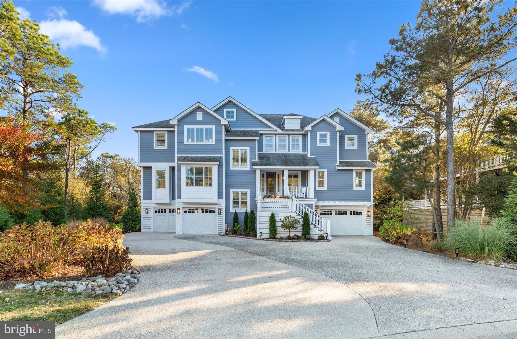 Expansive Coastal Elegance in North Bethany’s Premier Ocean Breezes Community! 
Discover the epitome of luxury in this exquisite, three-story, 7-bedroom, 7-bathroom coastal estate nestled within a private, gated North Bethany Community.   This rare gem is situated on one of the largest and most private homesites in the area, complete with a community pool (a rarity in North Bethany) and the pristine private beach within steps. From the moment you arrive, you’ll be captivated by the lush landscaping and an extended driveway with a three-car garage that together provide parking for up to 12 vehicles-perfect for hosting extended family. Upon entering the home, you’ll find bright and generous spaces for relaxed coastal living and entertaining. Highlights include a third floor vaulted main living room and a gourmet kitchen, a second floor family room with a kitchenette, a private elevator for convenient access to all three floors, a screened porch with a cozy gas firepit, numerous decks, including a rooftop deck offering a peek of the ocean, and a private deck off of the second family room with a sauna. 
Many recent upgrades throughout the home include a bunk bedroom with sleeping space for 9, a beautiful stone living room fireplace with a raised hearth, upgraded ensuite baths, elegant ship lap with extensive trim finishes throughout, designer lighting, electronic shades, extra storage and two separate laundry areas, plus, plus, plus.  The designer kitchen awaits with quartz countertops, an oversized island, custom cabinetry and a large walk-in pantry.  Hardwood plank flooring, designer furnishings throughout and the best of everything in this home makes for a truly exceptional property, designed with elegance, comfort, and the ultimate coastal lifestyle in mind.  This beautiful home is being offered fully furnished and turnkey (excludes select personal items).