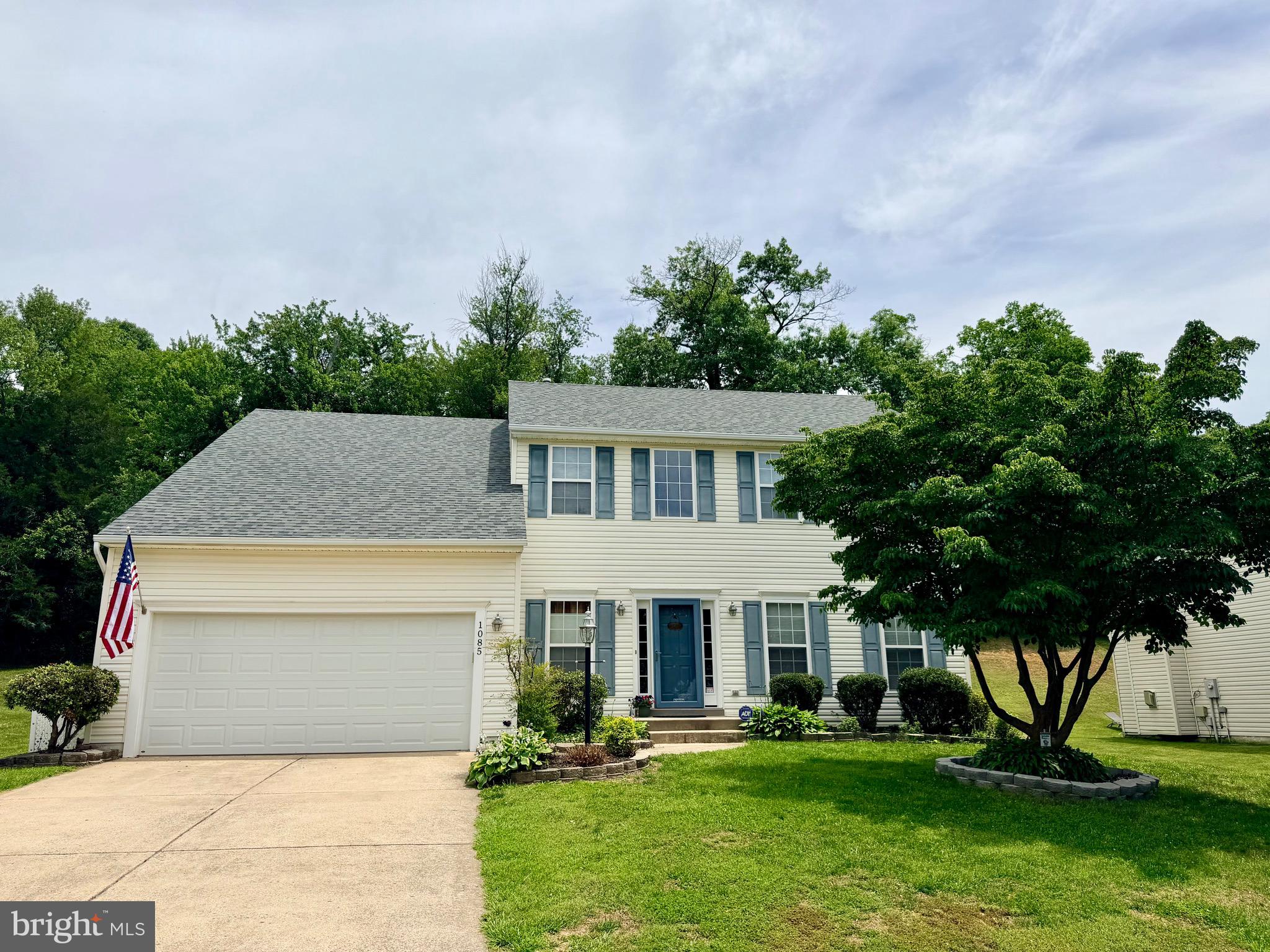 Beautiful Colonial home located in the sought after Redwood Lakes Community! Featuring a 2-story foyer upon entering. Main level offers a formal living and dining room, lovely kitchen with island, open to the bright and spacious family room featuring a gas fireplace! Upper level includes a primary bedroom and bathroom with soaking tub, 3 additional bedrooms, laundry room with washer and dryer included and a guest bath. Full basement with lots of storage space or potential for future living space! Exterior has beautiful landscaping and backyard patio with hotub! 2- car attached garage! Stay tuned for professional photos!