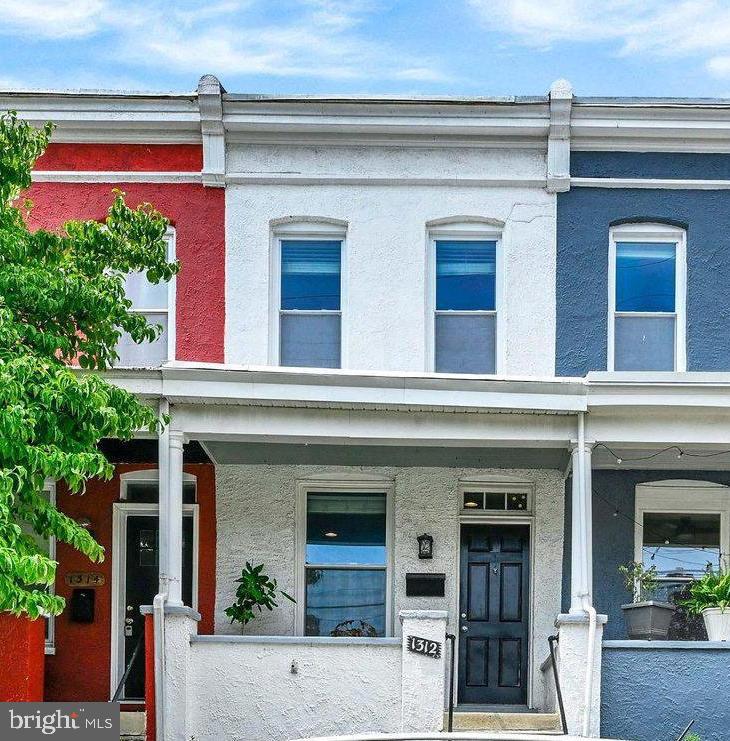 Welcome to 1312 Dellwood Ave,  perfectly located on a quiet street in the highly sought-after Hampden neighborhood where original hardwood floors and modern updates come together in a warm, inviting space that preserves its historic appeal. This home features numerous improvements throughout including newer appliances,  chimney & roof updates (2022), stove (2022) and washer (2023). The finished lower level includes a full bath and large window, offering flexible living space that can be used as an office, family room or guest area. Outside, the property shines with beautiful established flower gardens in both the front and back yards, creating colorful outdoor retreats throughout the seasons.  Ideally located near Hampden's shops, restaurants, and parks, this move-in-ready home offers character, comfort, and versatility.  Schedule your tour today as this one will go quick!