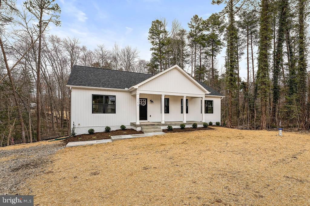 Completed New construction - The Boxwood from Ironwood Homes on 2.08 acres. Simple, yet elegant, this modern reinterpretation of country chic is the perfect home in which a young family can grow. The Boxwood’s open floor plan creates a bright and airy atmosphere. Each home is expertly fashioned with a luxury primary bathroom, farmhouse sink, exposed natural beams, and much more to give it a uniquely custom feel. Gorgeous 5 bedroom 3 full bath ranch home! Granite countertops and stainless steel appliances in the kitchen. There are tons of upgrades throughout the home- free-standing tub, hardwood floors, custom-look light fixtures, and gorgeous tiles! A completely finished basement provides another bedroom, a full bath, and a large recreation area! You don't want to miss this opportunity!