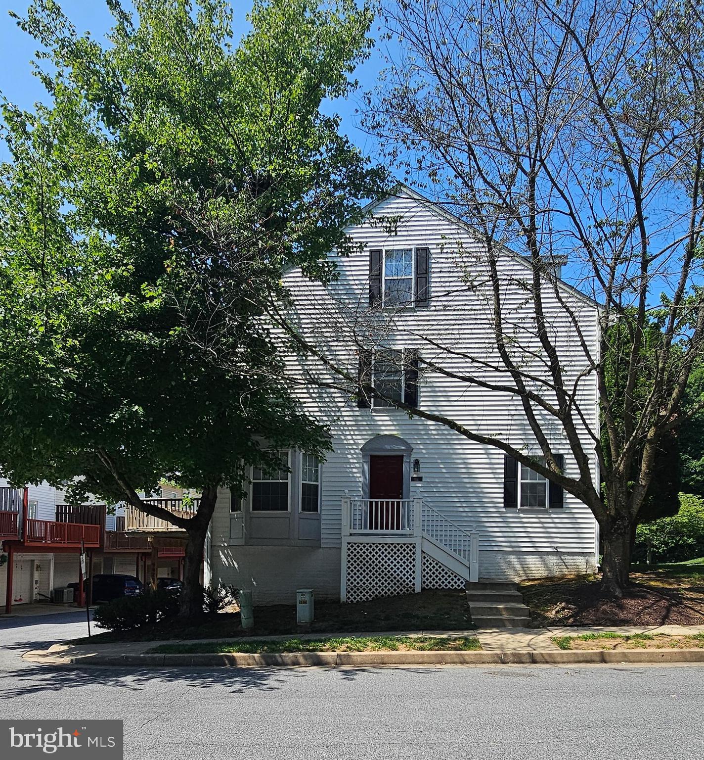 List price is Opening Bid at The Online Only Auction Sale to Be Held on The Auctioneers Website – Bidding begins Saturday, July 18th, @ 1:00PM and ends Thursday, July 23rd, 2026 @ 1:00PM. Welcome to 9823 Bon Haven Lane, an immaculate end-of-group townhome located in the desirable Villages of Winterset community. Offering approximately 2,064± square feet of finished living space, this beautifully maintained home features 3 bedrooms, 2 full baths, 1 half bath, three finished levels, and an attached two-car garage. The bright and open main level is filled with natural light from numerous windows and bay windows, creating an inviting atmosphere throughout. Hardwood flooring enhances the foyer and powder room, while crown molding adds elegance to the living and dining rooms. The spacious kitchen flows seamlessly into the living and dining areas, with access to a private rear deck—perfect for morning coffee, outdoor dining, or entertaining. The first upper level includes two spacious bedrooms, a full hall bath, and a conveniently located second-floor laundry room. The second upper level is dedicated to the impressive loft-style primary suite, featuring a relaxing sitting area, vaulted ceiling, remote-controlled ceiling fan, generous closet space, and a luxurious en-suite bath complete with a two-person soaking tub and separate shower. The finished lower level provides exceptional flexibility for a family room, home office, fitness area, media room, or guest space, with direct access to the attached two-car garage. Additional highlights include an updated Carrier HVAC system, providing year-round comfort and efficiency.