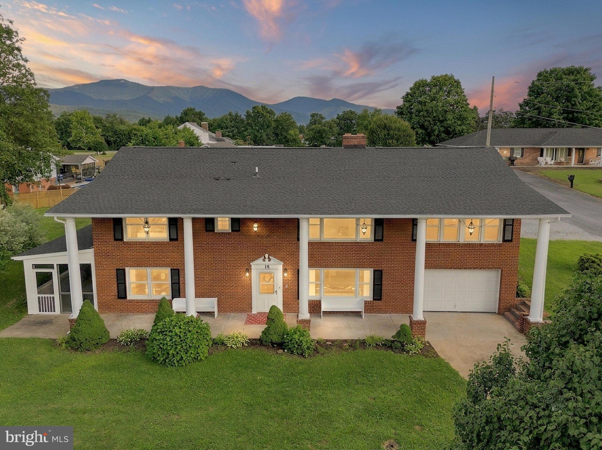 An in-ground pool, mountain views, and an adjoining parcel set this spacious brick Colonial apart. Offering over 3,000 square feet, 5 bedrooms, and 2.5 baths, there's plenty of room to spread out while being just minutes from downtown Luray.

The kitchen and dining area share one large, open space that's perfect for everyday living and entertaining. From there, step onto the screened porch to enjoy your morning coffee or relax at the end of the day.

Upstairs, the sunroom is filled with natural light and offers beautiful mountain views. It also provides direct access to the fenced pool area, complete with a slide and gazebo. Plumbing from a former wet bar is still in place behind the wall, offering the opportunity to add one again if desired.

The main level includes a versatile bonus room that's currently used as a bedroom by the sellers but could also make a great home office, playroom, hobby room, or additional living space.

The adjoining parcel is included, giving you a total of 0.52 acres to enjoy while offering the flexibility to create a garden, expand your outdoor living space, or keep the parcel for future investment or resale. 

If you've been looking for a home with space, flexibility, and room to enjoy the outdoors, this one is definitely worth a look.
