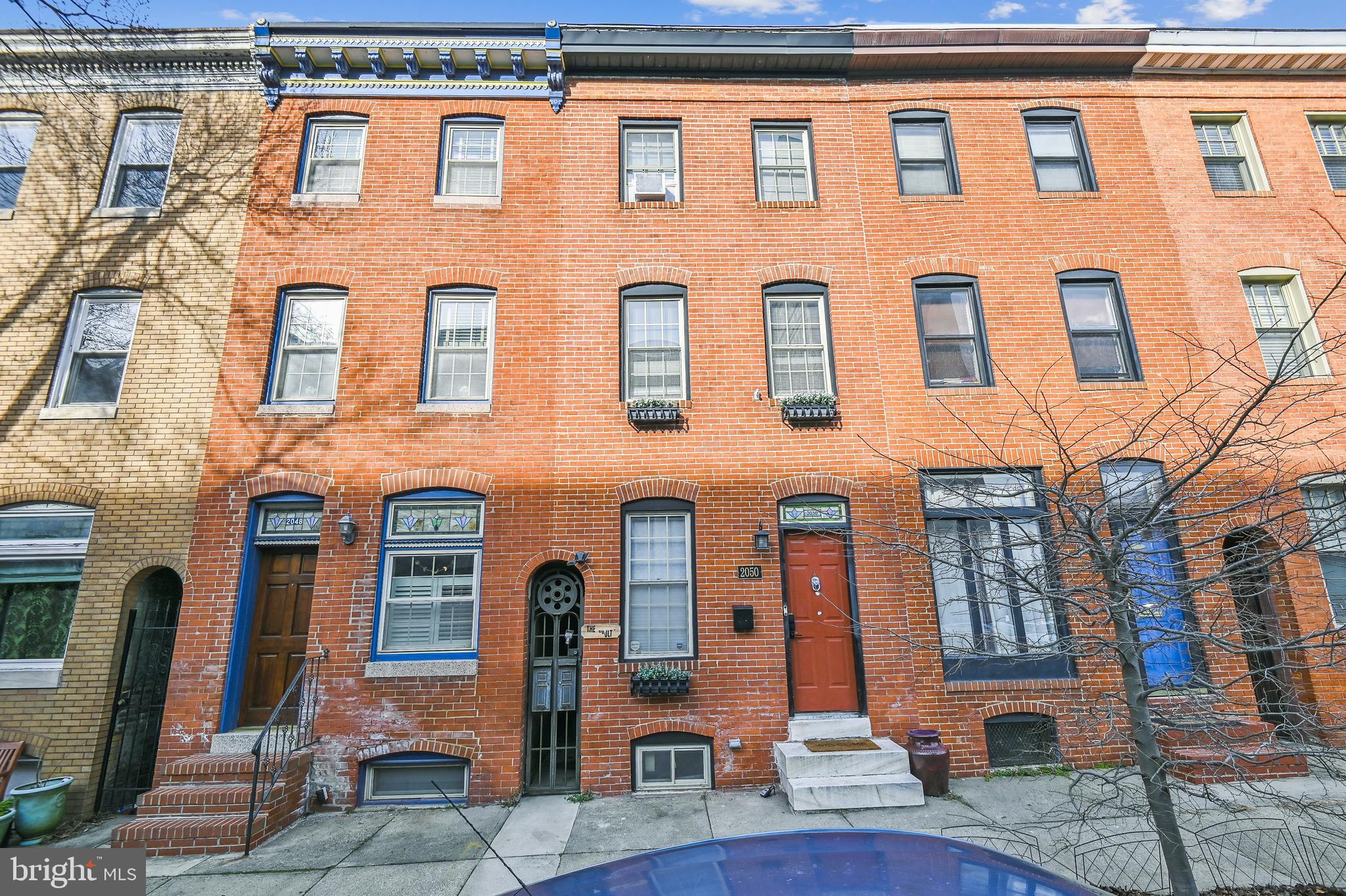 Looking to live in a 3-bedroom, 3-floor home in Upper Fells, Point with a studio apartment at the rear that brings in $1,550 per month?  Welcome to 2050 Bank Street.  This classic townhouse is within walking distance of the Inner Harbor, and close to all the best eating and entertainment destinations in Baltimore.  The main part of the house has two large and one smaller bedroom.  There are two bathrooms in this part of the house, which retains much of its original features, updated to more modern living.  The entire building is currently rented, but the 3-bedroom section with living room kitchen and 2 bathrooms will be available for a new owner by August 11, 2026.  The studio apartment at the rear of the building has a separate entrance and is always rented to traveling nurses, etc.  Take a look at City living with built-in revenue!