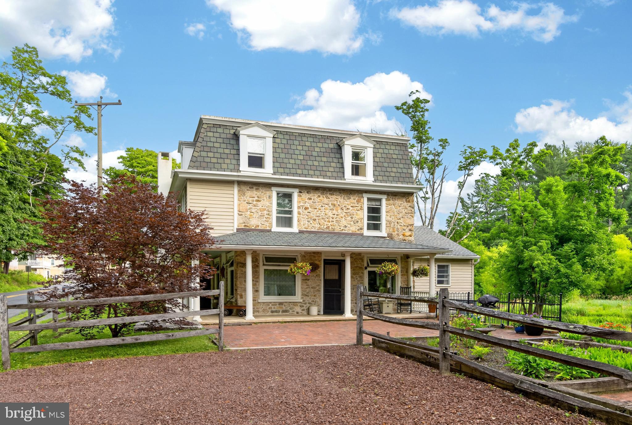 Welcome to 65 Race St. This exquisitely maintained home is a charmer- circa 1800's with additions, porcelain farmhouse sink, exposed stone, open beams,  original fireplace. The wrap around porch welcomes you right into the kitchen with Hickory floors, granite counter tops and deep window sills. The dining room features original pine floors, wainscotting, and the stone walls. Enjoy the  living room with the fireplace, a built in corner cabinet, and a doorway to the porch. Walking back to the rear of the first floor we find the family room addition with vaulted ceiling, skylights, and a window wall that lets you view nature from your lounge chair. A full bath with a shower is around the corner and there is also a utility sink. As you head upstairs you'll find a landing for a desk or reading nook- you decide. The 3 bedrooms continue the charm- wood floors, some crown molding, solid wood doors, deep window sills.  The 2nd full bath features a clawfoot tub/shower. A surprise awaits on the 3rd floor. More finished open space. It had been a super sewing and craft room. What will your vision be?  Let's go back outside to the brick patio and garden walkway. A shed for tools and gardening is a perfect addtion. There's both a side yard and a rear yard for outdoor fun. The location is close to the Route 100 corridor with shopping and medical facilities minutes away.  Wow! This home is a must see. Schedule your appointment today.
This home is a must see! Schedule today.
