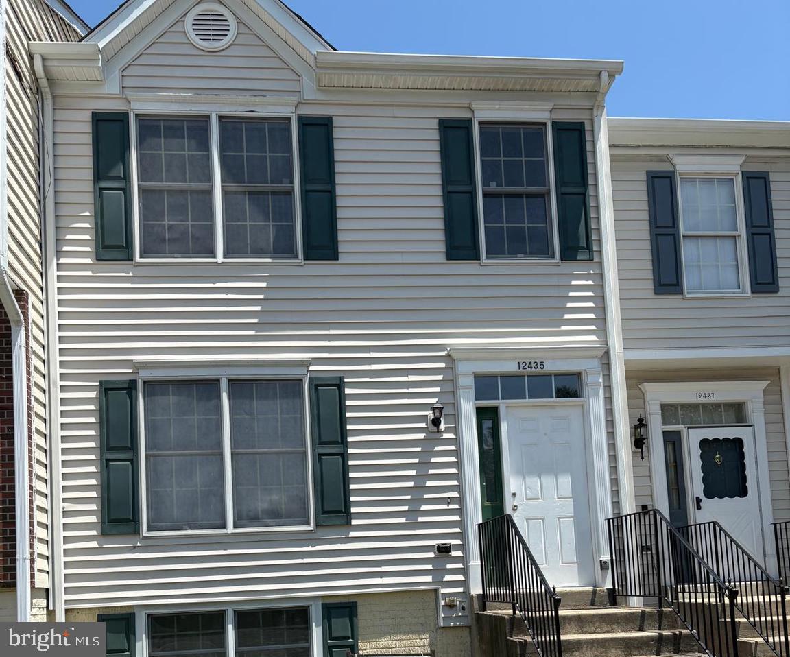 ABSOLUTELY BEAUTIFUL!!!   Nicely renovated 4BR/3.5BA Townhome in the highly sought after community of Lakewood Estates.  This home features gorgeous hardwood floors on main and upper level, and Luxury Vinyl Plank throughout lower level.  Fresh, custom two-tone paint throughout,  as well as Kitchen with brand new quartz countertops leading out to oversized deck backing to view of mature trees.  Large primary suite with walk in closet, renovated bathroom and two other generously sized bedrooms and shared bath on the upper level.  Lower level features a a 4th bedroom and huge bathroom as well as ample storage and a large recreation/family  room that walks out to the back yard.  Newer siding / roof.  TWO assigned parking spaces and plenty of guest parking throughout the neighborhood.  Nothing left to do but move right in!
