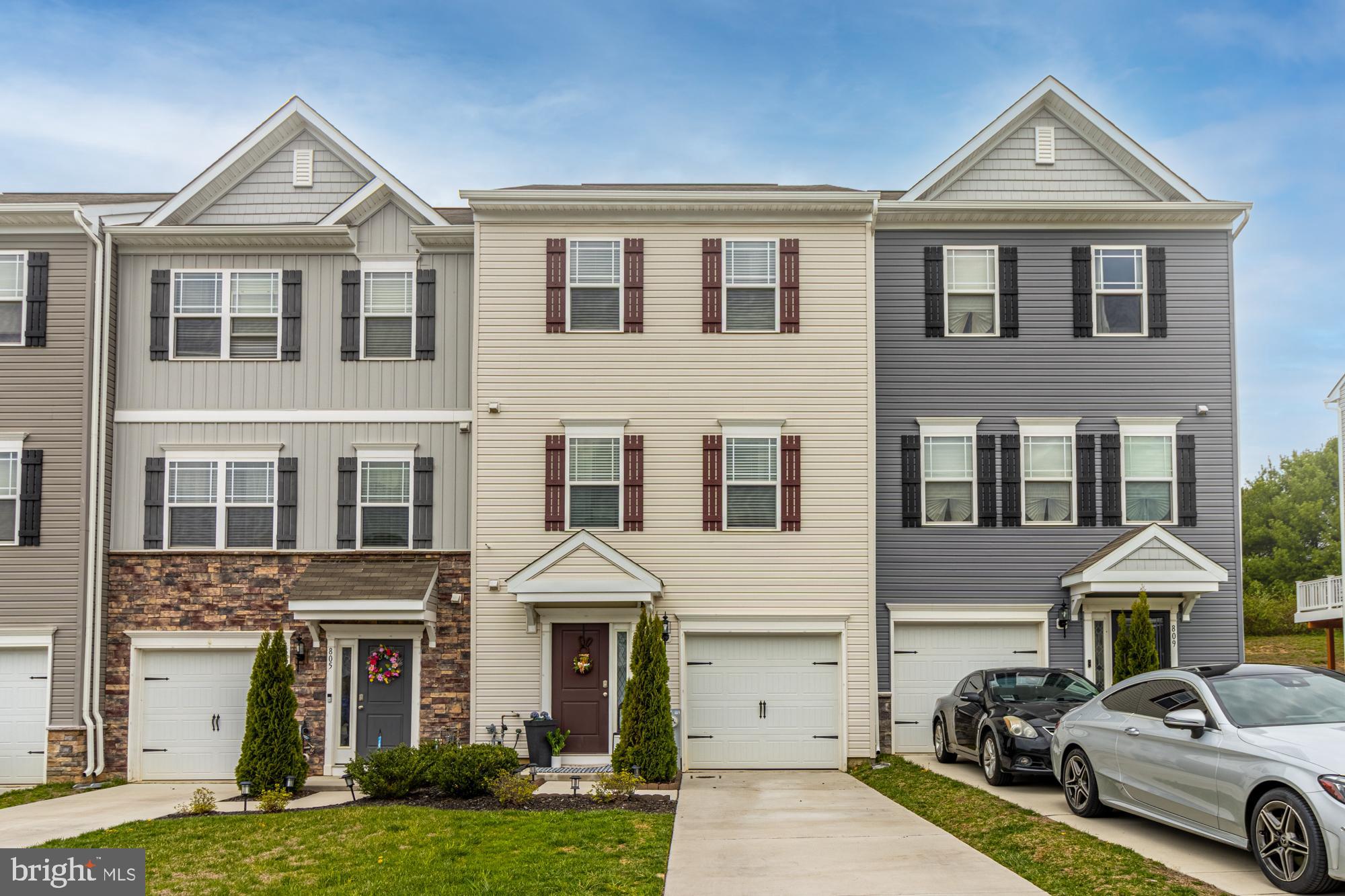 Welcome home to this like-new townhome in Magnolia Landing! This home features 3 bedrooms, 2 full bathrooms, 1 half bathroom, garage and fenced in backyard. Enter the home through the spacious foyer with a large coat closet, additional storage closet, access to the garage and off the back of the main floor you will find an unfinished area ready for you to make it into additional living space. In the unfinished area you have plenty of room for storage, your gas water heater, gas furnace, and a walkout to your fenced in backyard. Heading up to the middle level you will find an open and spacious kitchen, dining area, family room, and half bathroom. The kitchen boasts upgraded GE stainless steel appliances, granite countertops, upgraded light fixtures, slow close cabinets and drawers, plenty of counter space and a large pantry. Upstairs you'll find three bedrooms, a laundry closet, and 2 full bathrooms. The owner's suite has a huge walk-in closet and bathroom with double vanity. One of the additional bedrooms has a charming accent wall and walk-in closet. This home backs to open space for added privacy. The owner is reseeding the backyard. Parking is plentiful, between the 1 car garage, and 2 car driveway, also there is extra parking in the neighborhood for visitors as well. Set up your appointment to check it out today before it is gone!