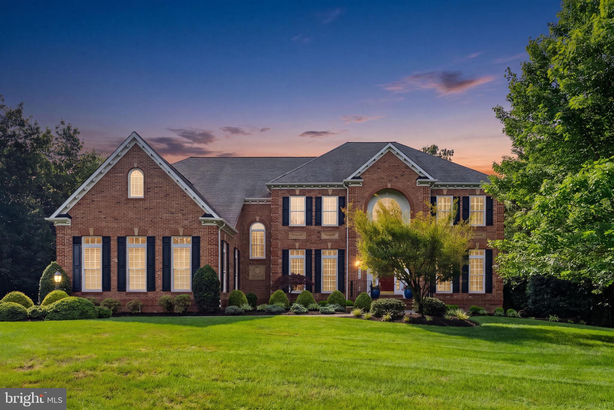 Nestled on a breathtaking 3.12-acre estate in the prestigious Cedar Crest community, this extraordinary custom residence offers an exceptional blend of timeless elegance, privacy, and refined luxury. Surrounded by mature trees and professionally landscaped grounds, this remarkable estate boasts over 8,300 square feet of exquisitely finished living space, thoughtfully designed for sophisticated entertaining and comfortable everyday living.

A grand, light-filled interior welcomes you with elegant formal and casual living spaces, refined architectural details, and beautiful plantation shutters throughout. At the heart of the home, the gourmet chef’s kitchen flows effortlessly into the inviting family room, anchored by a stunning two-sided fireplace that creates a warm and elegant focal point while being enjoyed from both the kitchen and family room. Just beyond the kitchen, the sun-filled morning room provides the perfect setting for casual dining, morning coffee, or simply taking in views of the picturesque grounds.

The upper level features five spacious bedrooms, each offering its own private en-suite bathroom and custom-designed closet, providing exceptional comfort and privacy for family and guests. The luxurious owner’s suite is a true private retreat, featuring a spacious sitting room, a spa-inspired bath, and an expansive custom walk-in closet thoughtfully designed for both beauty and functionality.

The exceptional lower level is an entertainer’s dream, complete with an expansive recreation room, private home theater, dedicated fitness studio, and an additional guest suite, offering incredible flexibility for today’s lifestyle.

Designed with both luxury and peace of mind in mind, the home is equipped with a state-of-the-art security system featuring motion detection technology and strategically placed exterior video cameras that monitor every entry point, providing exceptional security and confidence whether you’re home or away.

Step outside to your own private outdoor oasis where a stunning flagstone patio and covered pavilion overlook the picturesque grounds. The sprawling estate offers endless possibilities for outdoor entertaining, recreation, or the future addition of a resort-style pool, all while enjoying the tranquility and privacy that only a property of this caliber can provide.

Located within the highly acclaimed Loudoun County Public School system, this home is served by Buffalo Trail Elementary, Willard Middle School, and Lightridge High School.

Perfectly situated just minutes from major commuter routes, Dulles International Airport, premier shopping, fine dining, wineries, parks, and everyday conveniences, this exceptional estate delivers an unmatched combination of luxury, convenience, and serenity.

A truly rare offering, this is one of Cedar Crest’s premier estate residences—a home where timeless craftsmanship, thoughtful design, unparalleled privacy, and modern security come together to create an extraordinary living experience.