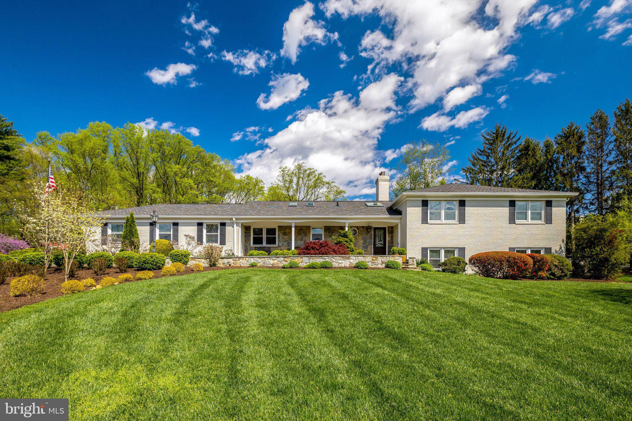 A RARE AND SPECIAL OPPORTUNITY just outside the Town of Vienna—set on a beautiful 1.43-acre flat corner lot—offering a seamless blend of space, privacy, and everyday ease. This inviting home features over 4,000 square feet of finished living across four thoughtfully designed levels, with 5 bedrooms and 4 baths. It has been meticulously cared for, with over a decade of meaningful, high-quality improvements that truly enhance daily living.

The main level unfolds with a natural, welcoming flow. The open kitchen, complete with updated stainless steel appliances, connects effortlessly to the dining area and a comfortable living space where everyone gathers with ease. A mud room/laundry room with a powder room AND a renovated powder room complete this level with a fresh, polished touch.

Upstairs, you’ll find three spacious bedrooms, including a serene primary suite with en-suite bath, along with a well-appointed hall bath serving the additional bedrooms.

The walk-out lower level offers wonderful flexibility—anchored by a warm, stone wood-burning fireplace in the family room. Two additional bedrooms, a full bath, and French doors opening to the side yard create an ideal space for guests, extended living, or work-from-home needs. One level below adds even more versatility, with a gym (or rec room), along with generous finished storage and utility space.

Outdoors, the setting is truly special. The expansive, thoughtfully professionally landscaped yard creates a private retreat rarely found this close to Vienna. A large in-ground pool, rear deck, and charming cedar-roofed porch invite both lively gatherings and quiet, everyday moments—designed to be enjoyed throughout every season.

Additional highlights include an oversized driveway, attached two-car garage with access to a secured third bay, and a backyard shed with electricity—perfect for hobbies, tools, or additional storage.

All of this, within the sought-after Flint Hill/Thoreau/Madison school pyramid, and just 2 miles to the heart of downtown Vienna. Enjoy easy access to dining, shopping, and daily conveniences, along with seamless commuting via Routes 66, 495, and 123, the Dulles Toll Road, three Metro stations, and both Dulles International and Reagan National Airports. Reston Town Center is just moments away.

For outdoor enthusiasts, the location is exceptional—with convenient access to Clarks Crossing Park and the W&OD Trail, offering miles of wooded trails for walking, running, biking, and exploring. From here, it’s just 2 miles to downtown Vienna and 4 miles to Reston Town Center along the trail.

Schools:
Flint Hill ES
Thoreau MS
Madison HS