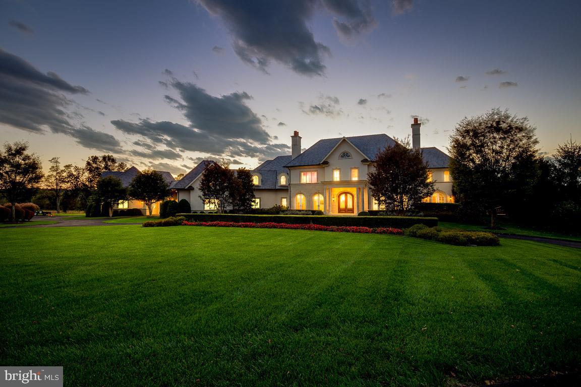 Nestled within the gates of the exclusive, award winning Creighton Farms community is this one of kind masterpiece designed and built by top builder, The Galileo Group. Situated on a majestic, 3+ acre, $1.5 million premium lot, this remarkable Estate home boasts every update and luxurious appointment imaginable and offers breathtaking mountain, water and golf course views. The owner has put in over $2.5 million into creating a truly phenomenal backyard oasis, which includes a gunite pool, pool-house with full bathroom, Gazebo with fireplace. Over $1 million in structured wiring throughout this 18,000+ square foot estate home  (11 miles of structured wiring to be exact!). $250K Geothermal heating and cooling system. $250K+ slate roof. Six car garage includes a Carriage House with a full bedroom, bathroom and loft sitting area on the upper level. A three-floor elevator will take you to every level within the home. With over $9 million in the build and and an offer price of $5 million, this unbelievable home is absolutely the best buy in all of Northern Virginia and Loudoun County.  With your membership, Creighton Farms offers a wide variety of unparalleled amenities including the 18-hole Jack Nicklaus Signature Golf Course, two Har-Tru and two USTA hard-surface tennis courts, fitness and wellness facilities, a resort style pool and an elegant Club House, which offers indoor and al-fresco dining, overnight club rooms for members and guests, Board Room, Library, Golf Shop and more. You can even take your membership with Creighton Farms when you travel... with Southworth's Club Reciprocity Program,  your Creighton Farms membership will allow you enjoy reciprocal privileges at all clubs and resorts owned or managed by Southworth worldwide!